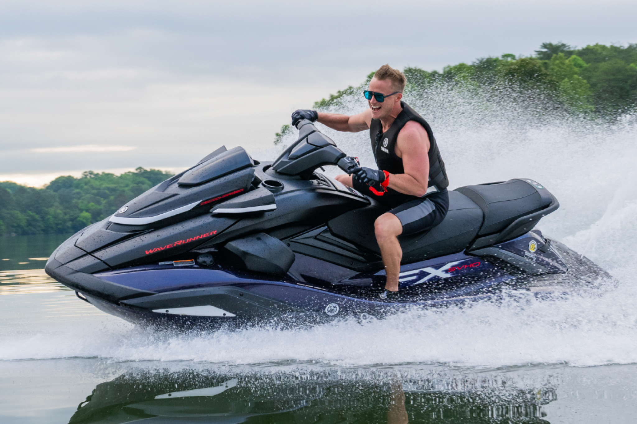 Rider accelerating across open water on the 2026 Yamaha FX SVHO, showcasing its supercharged performance, aggressive handling, and full-size stability.