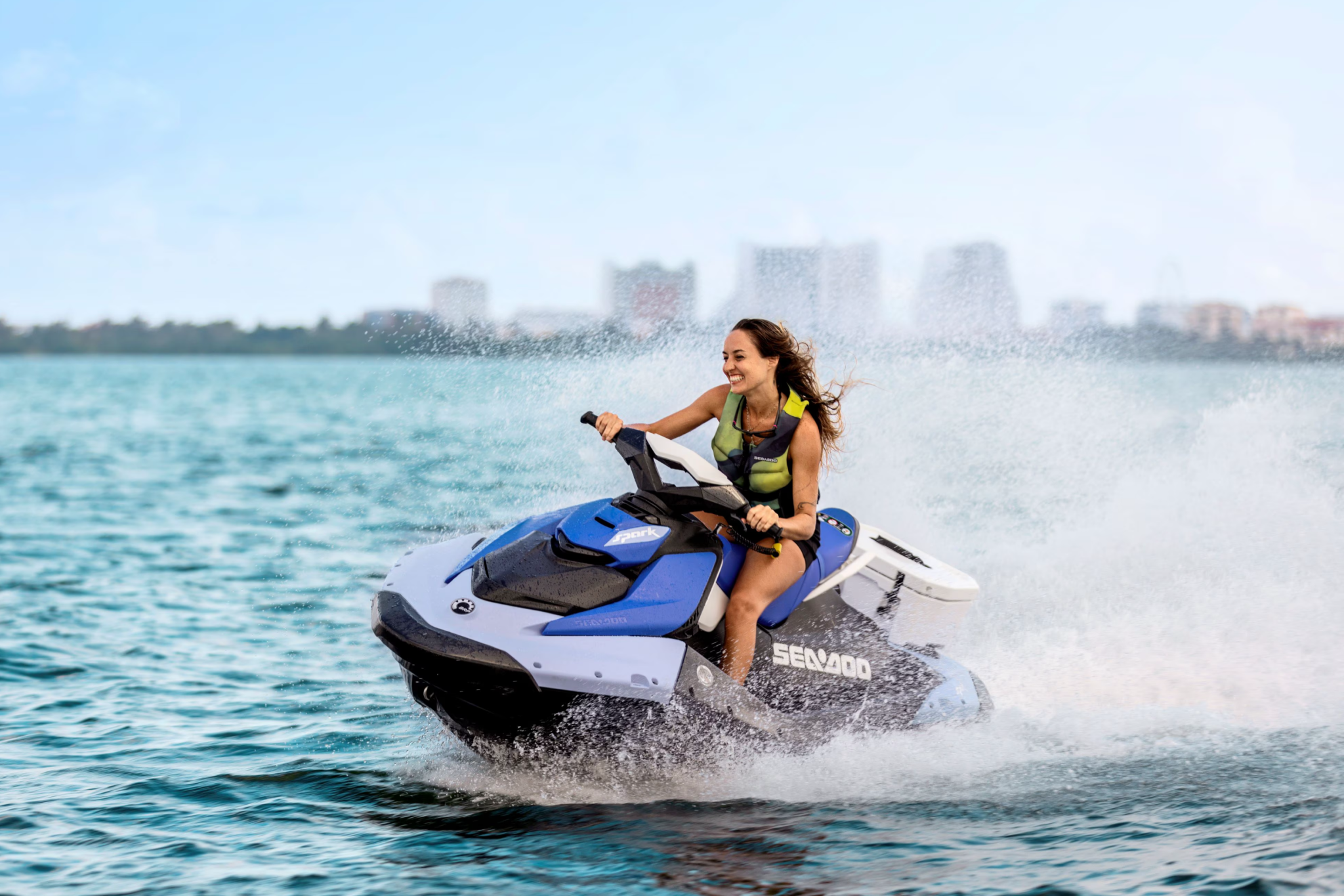 Rider enjoying the 2026 Sea-Doo Spark on open water, highlighting its lightweight design, agile handling, and fun-focused performance.