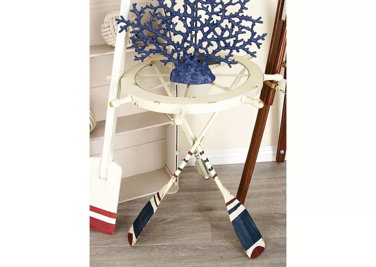 Bring the Coastal Charm Home with the Deco 79 Metal Round Accent Table with Oar Shaped Legs 4