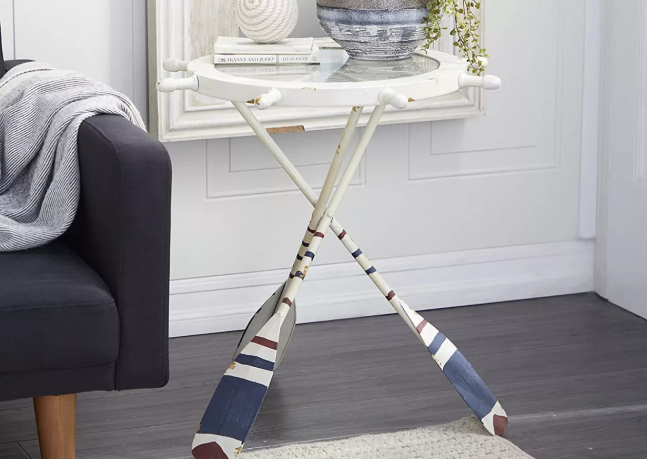 Bring the Coastal Charm Home with the Deco 79 Metal Round Accent Table with Oar Shaped Legs 5