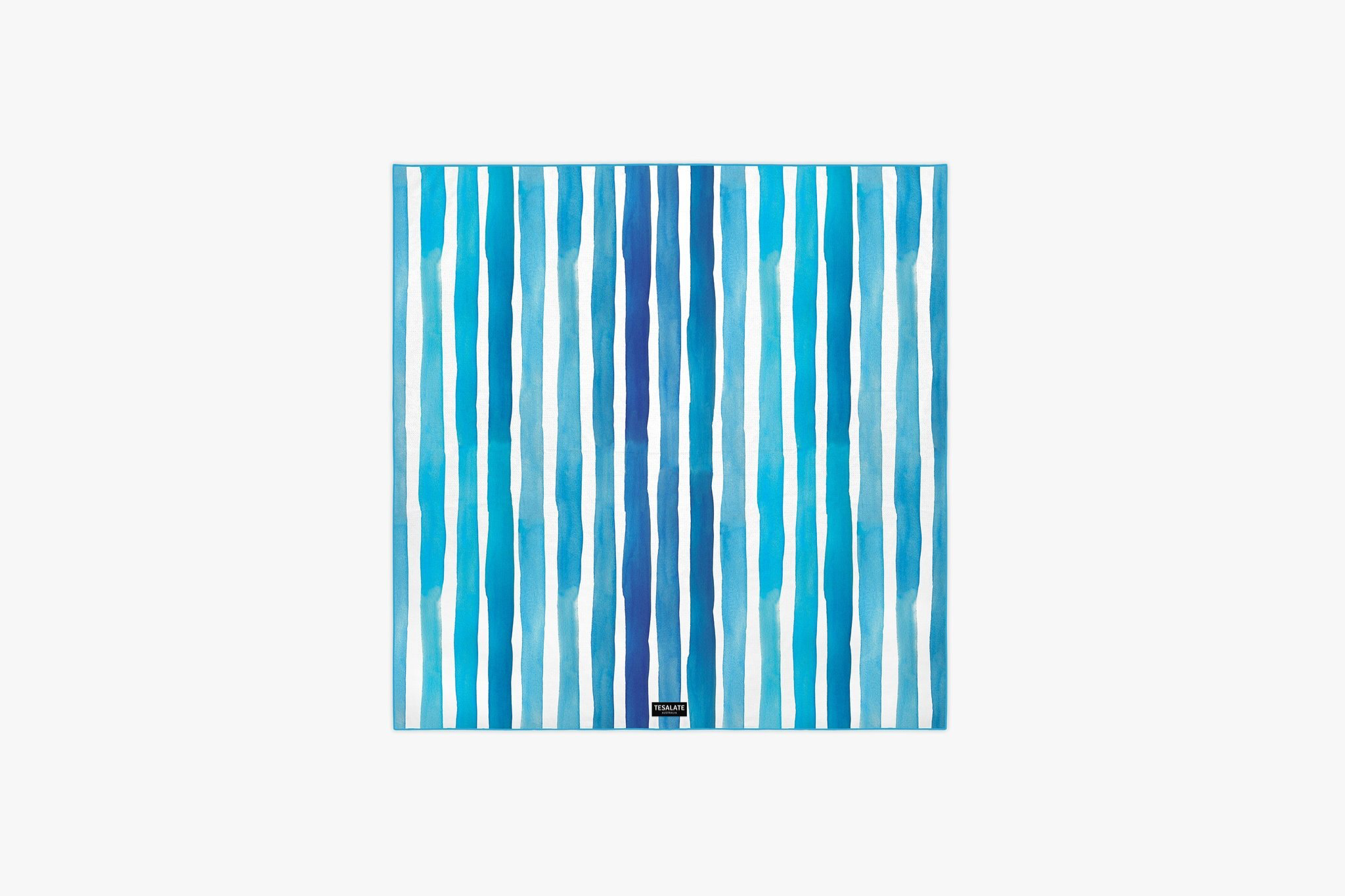 Tesalate Bora Bora sand-free beach blanket with blue watercolor stripes - top choice among the best beach blankets for quick-drying performance