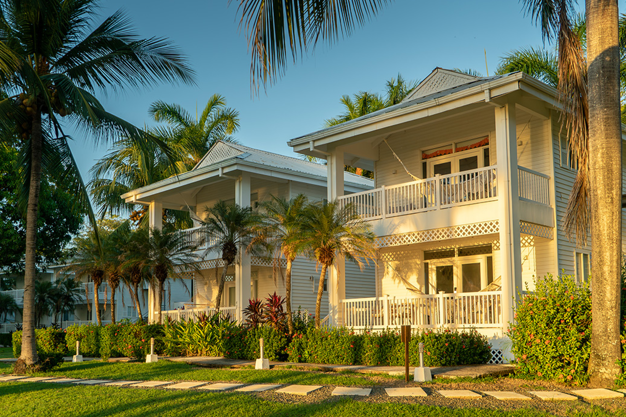 Tropical garden pathways and Caribbean-style villas at Azul Hotel & Retreat on Playa Azul—recognized as one of the best beach hotels for quiet, boutique stays in Costa Rica.