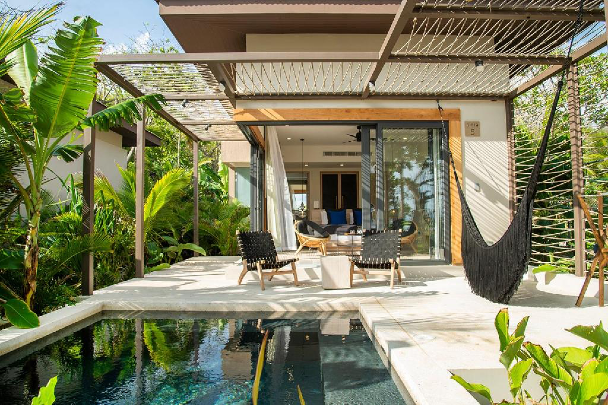 Modern beachfront villa with private plunge pool and hammock at Hotel Nantipa in Santa Teresa—a standout among the best beach hotels in Costa Rica for its design and beachfront setting.