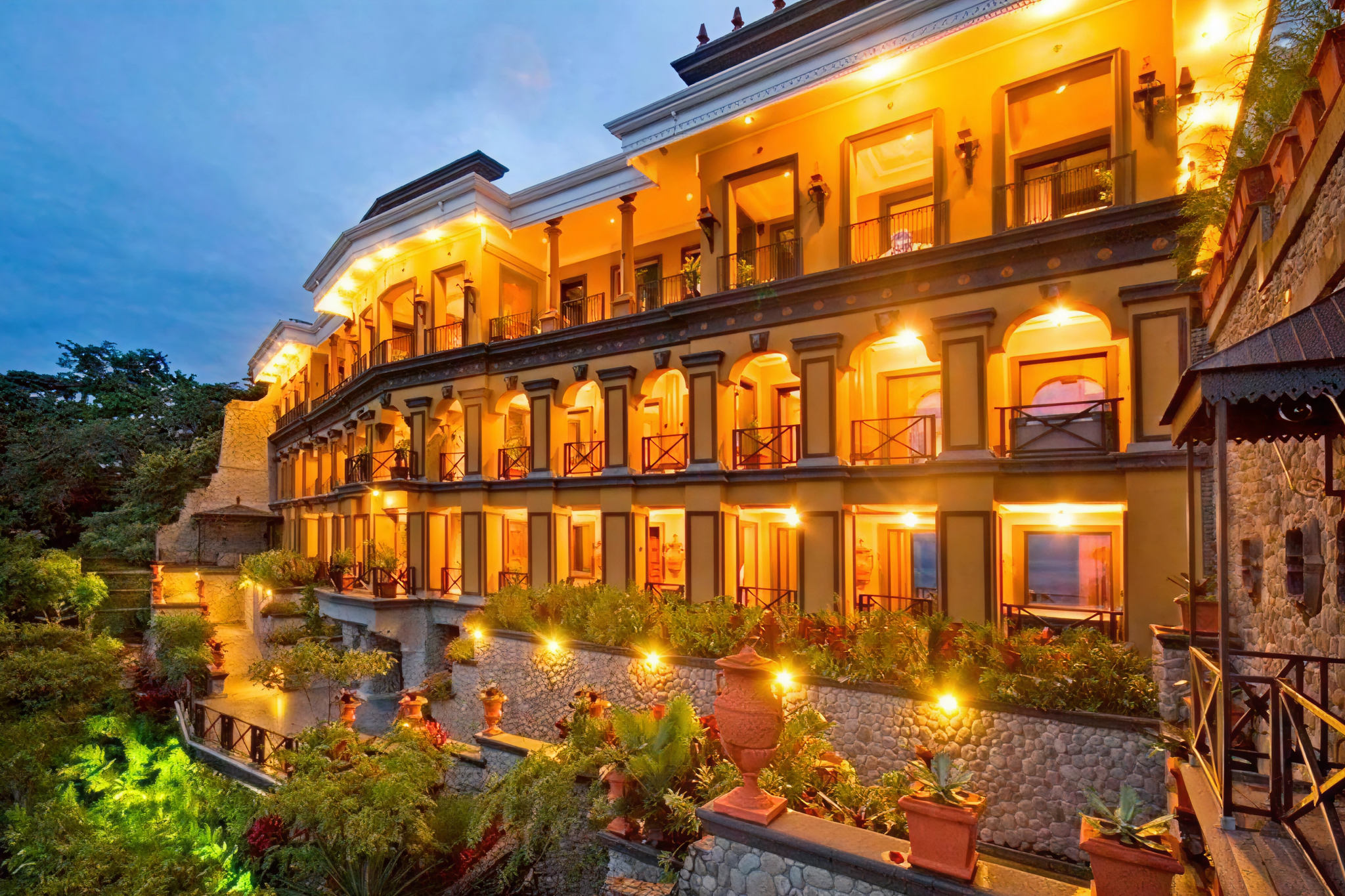 Elegant hillside retreat with neoclassical architecture at Hotel Villa Caletas above Jacó—offering one of the best beach hotel experiences with panoramic Pacific views.