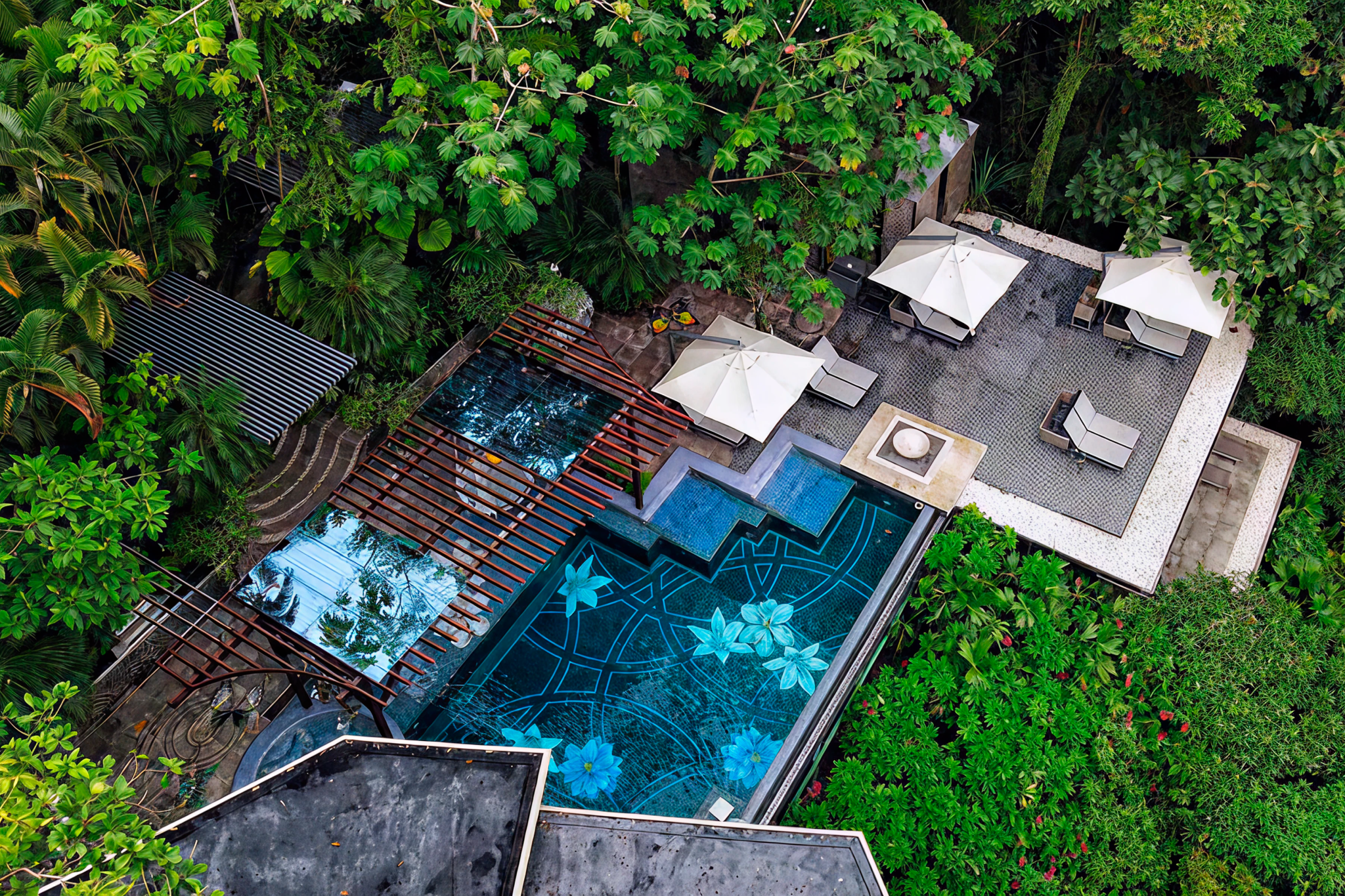 Drone view of W Costa Rica’s pool area and direct beach access at Playa Conchal—among the best beach hotels in Costa Rica for vibrant design and modern amenities.