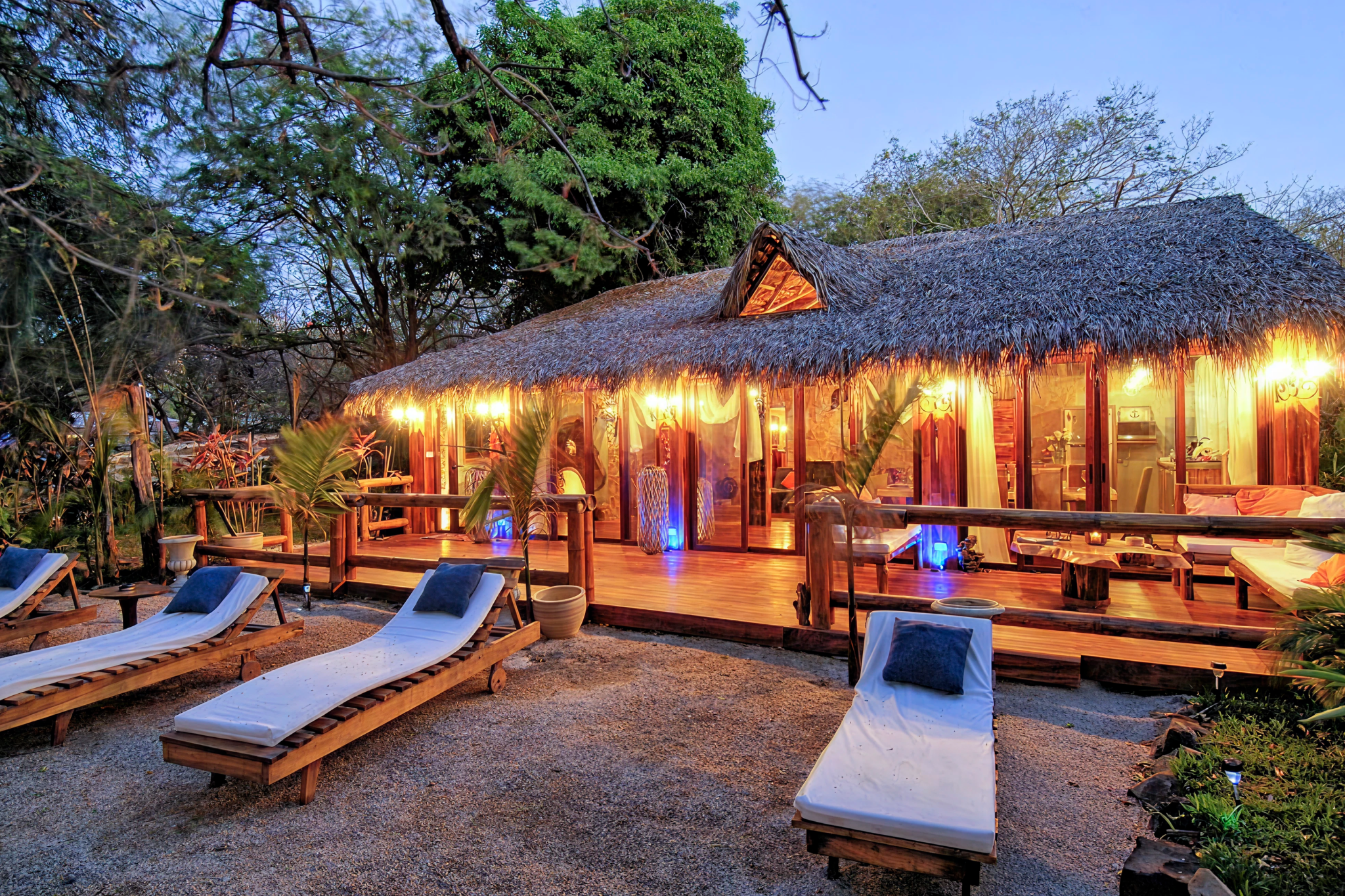 Handcrafted beachfront bungalows with direct sand access at Ocho Artisan Bungalows in Tamarindo—among Costa Rica’s best beach hotels for authentic, laid-back luxury.
