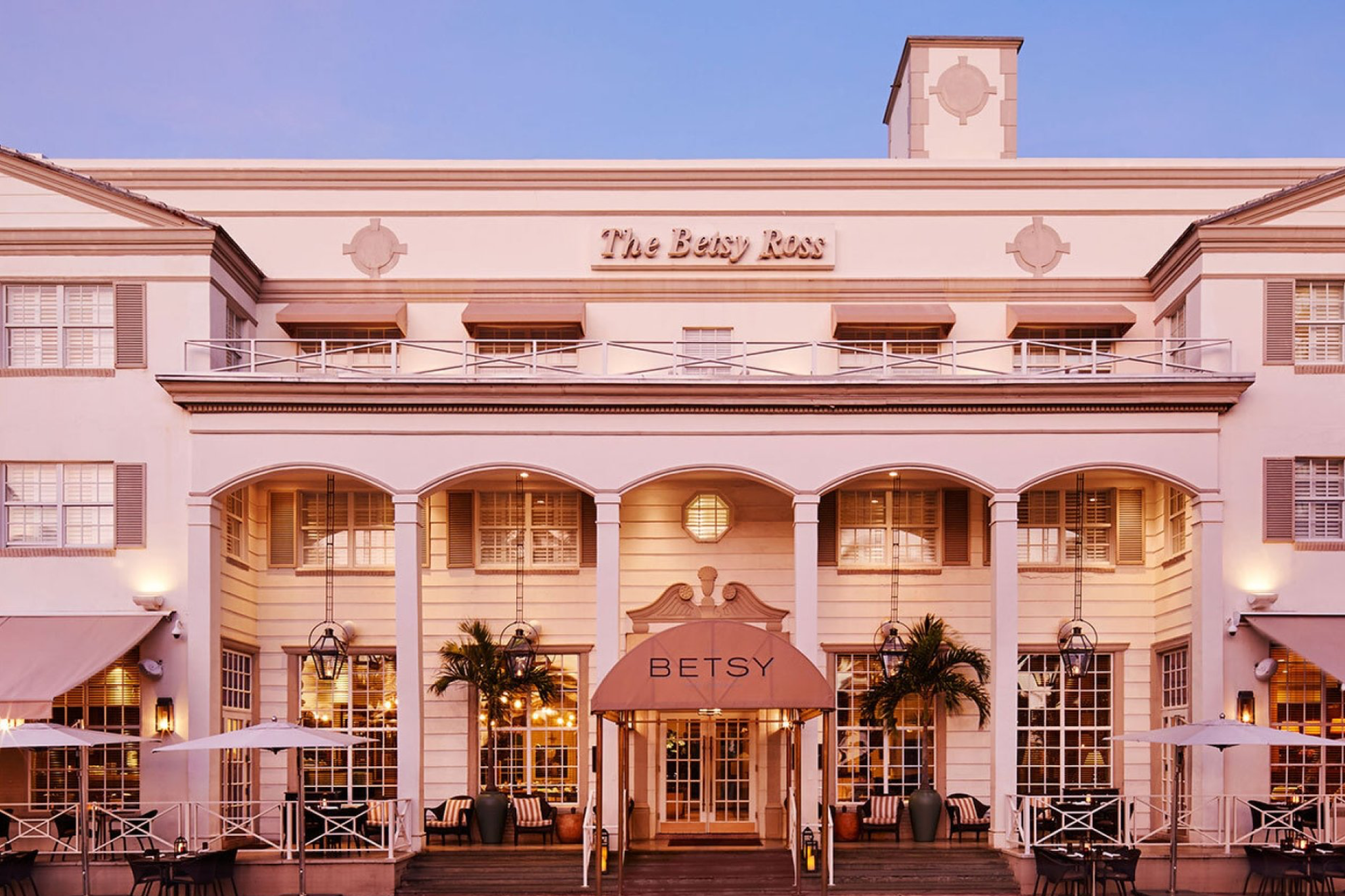 Front facade of The Betsy South Beach at sunset — a Miami landmark and one of the best luxury beach resorts in the United States.