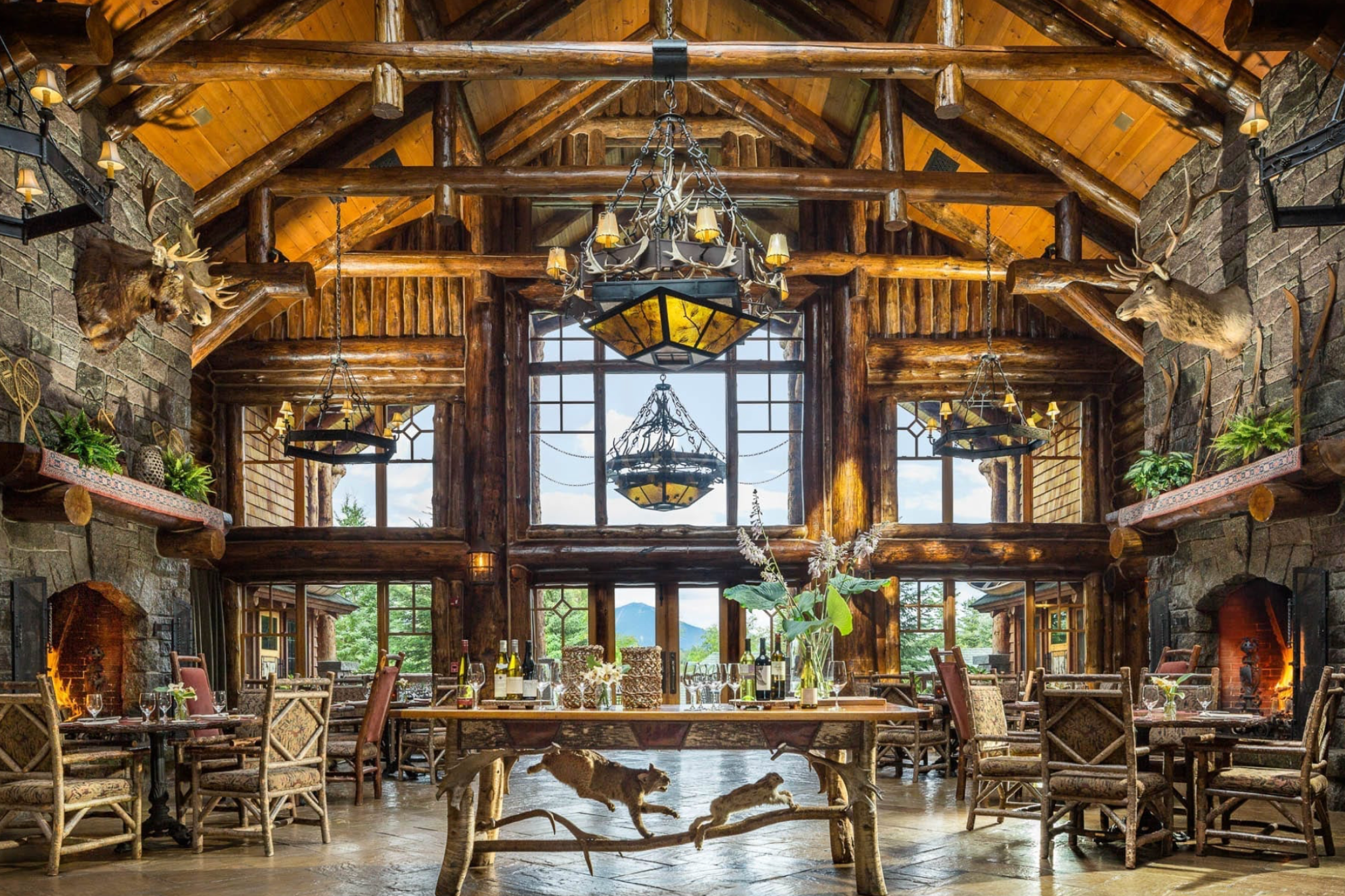 Rustic timber dining hall at Whiteface Lodge in Lake Placid — representing the best luxury beach resorts in the United States with alpine style.