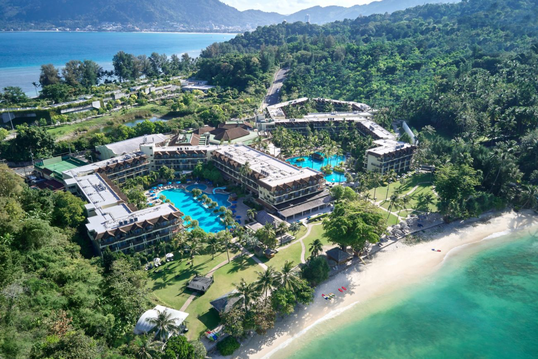 Secluded cove and expansive pools at Phuket Marriott Resort & Spa, Merlin Beach — a family favorite