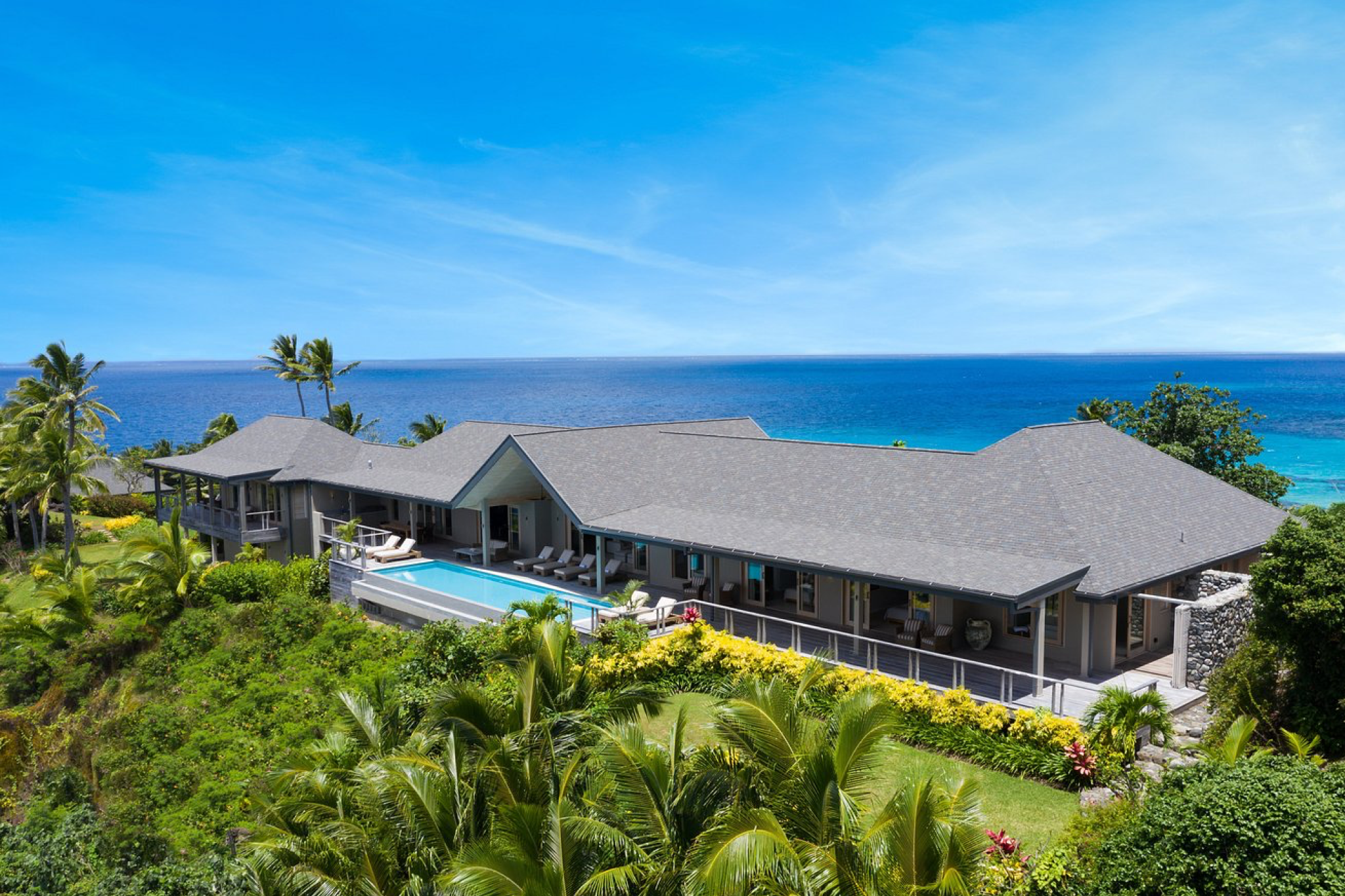 Expansive hilltop villa with infinity pool facing the open ocean at Kokomo Private Island, capturing the resort’s elevated luxury as one of the best beach resorts in the South Pacific in 2025.
