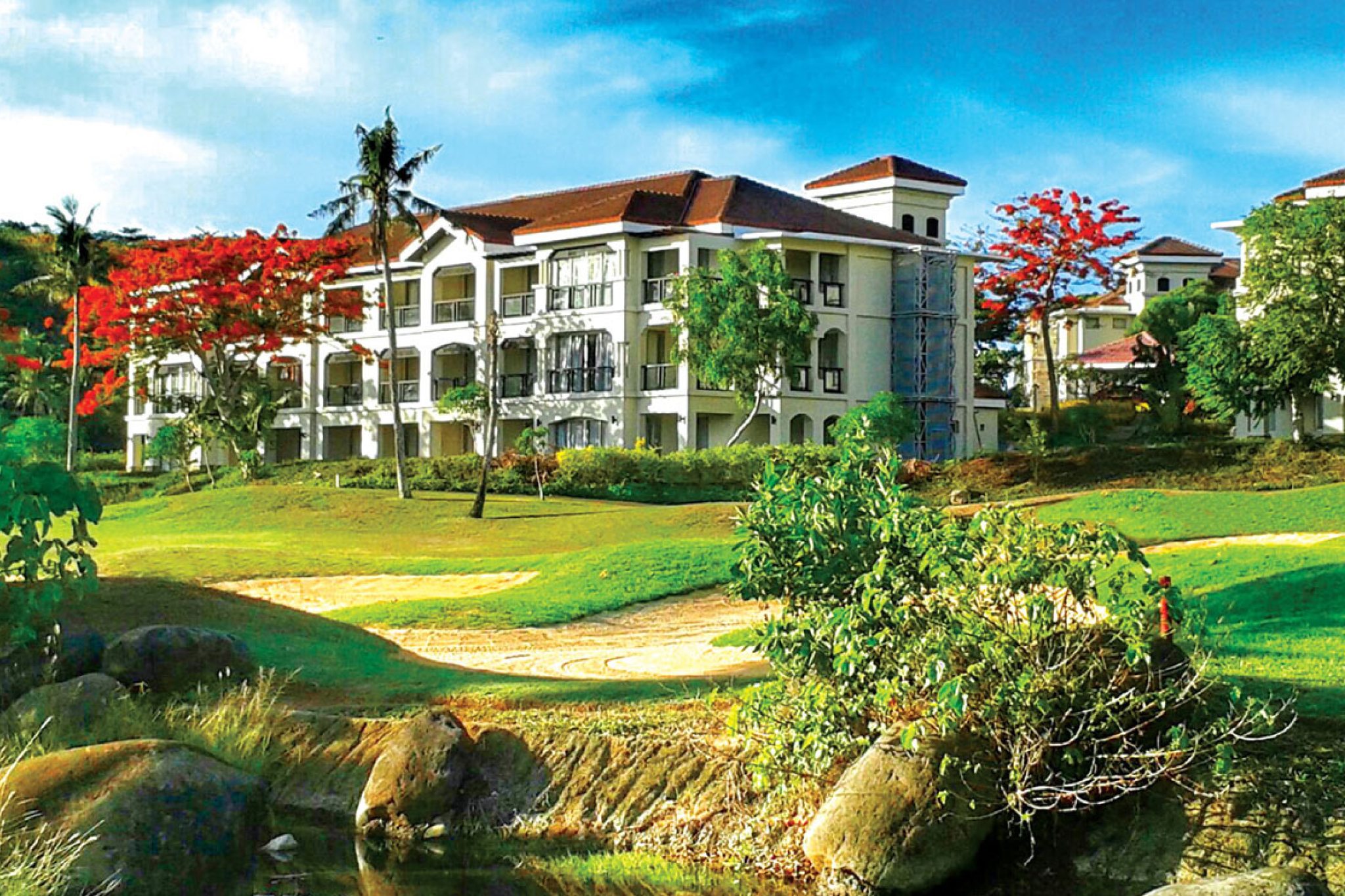 Spacious villa-style accommodations on the golf course at Fairways & Bluewater Boracay, among the best beach resorts in the Philippines.”