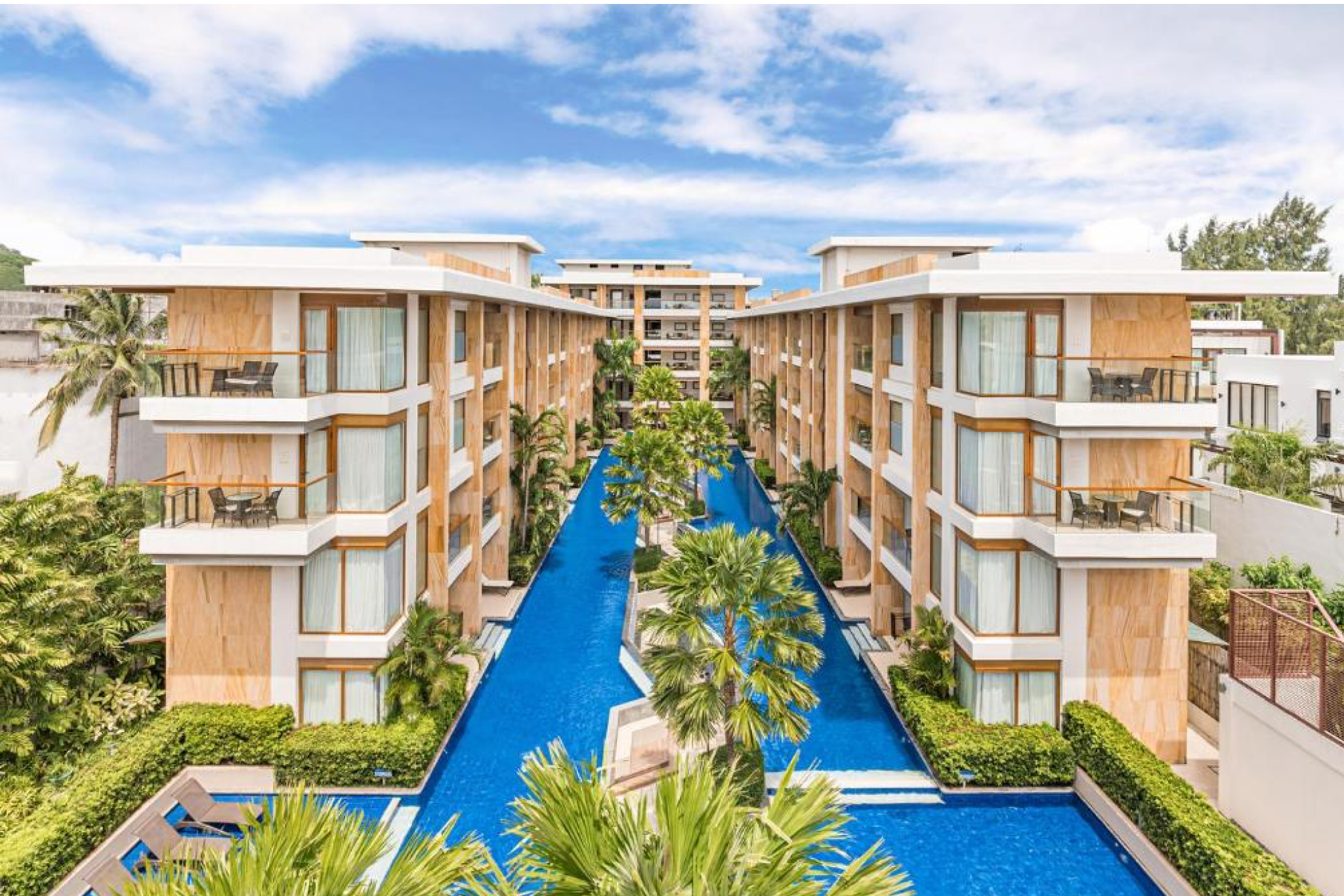 Rooftop infinity pool and central courtyard at Henann Crystal Sands Resort, voted one of the best beach resorts in the Philippines.