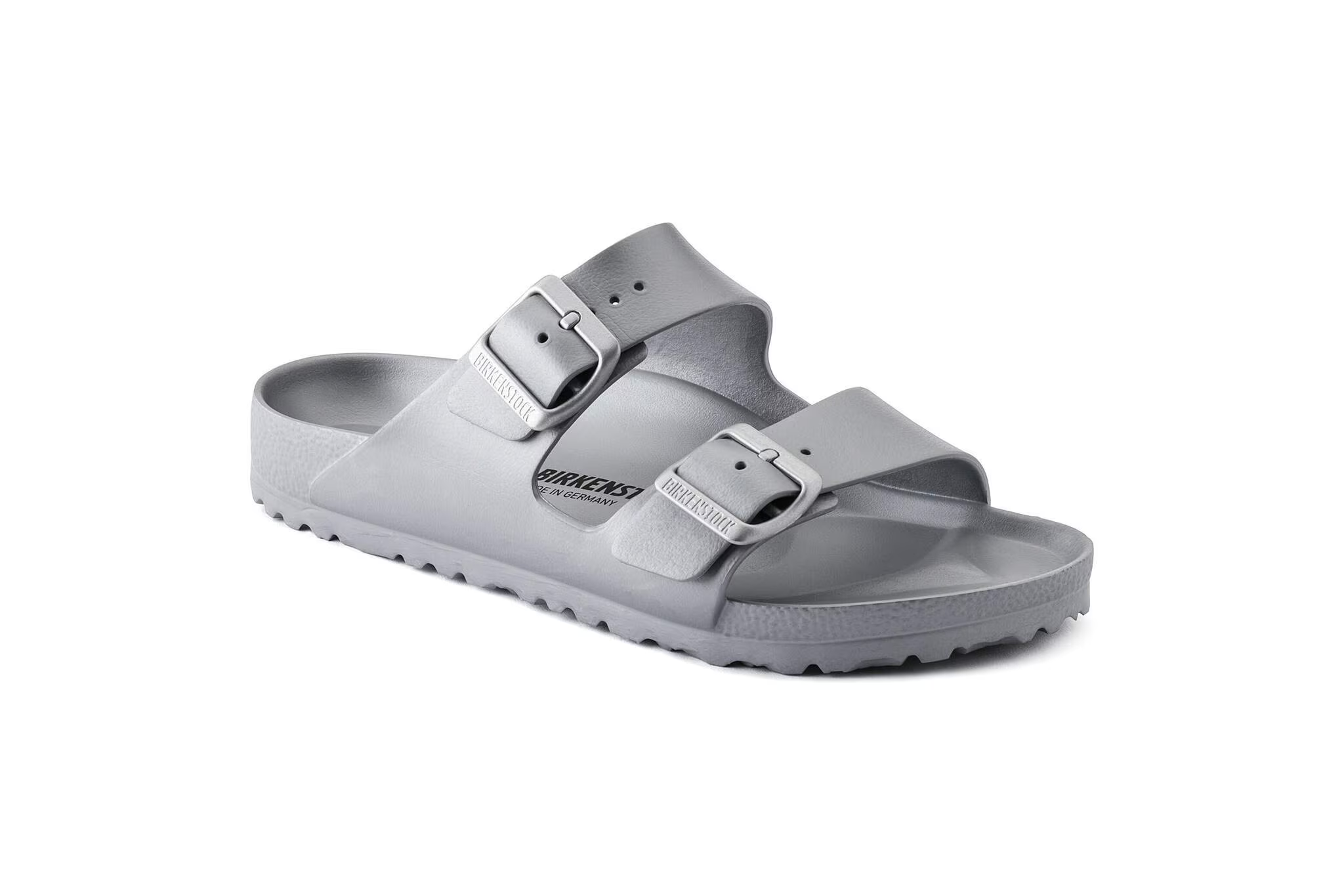 Silver Birkenstock Arizona EVA sandal with waterproof double straps and contoured footbed, among the best beach sandals for women who want iconic comfort in a water-ready form.