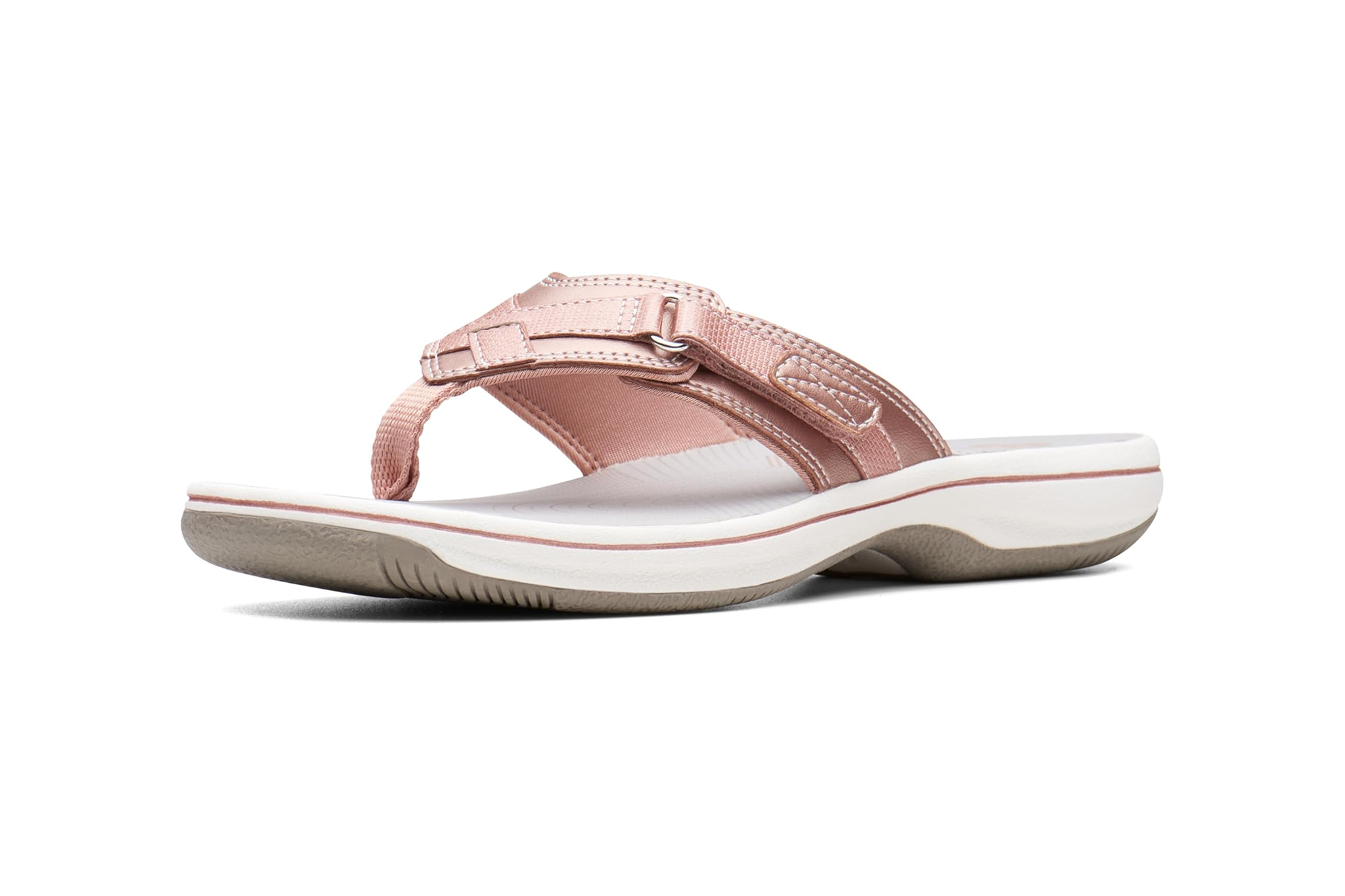 Rose gold Clarks Breeze Sea sandal with cushioned sole and adjustable thong strap, among the best beach sandals for women seeking budget-friendly all-day support.
