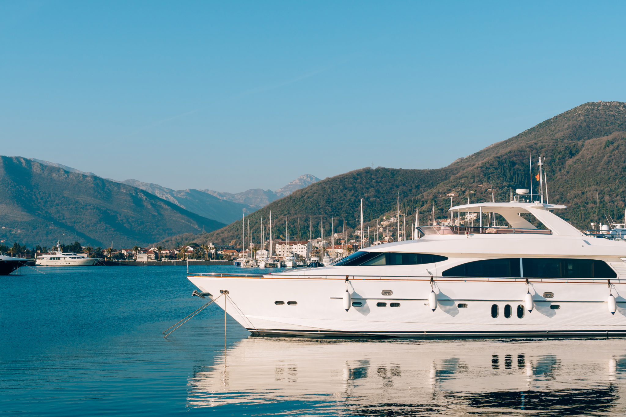 Luxury yacht in a coastal marina — perfect setting for some of the best boat names inspired by elegance and adventure.