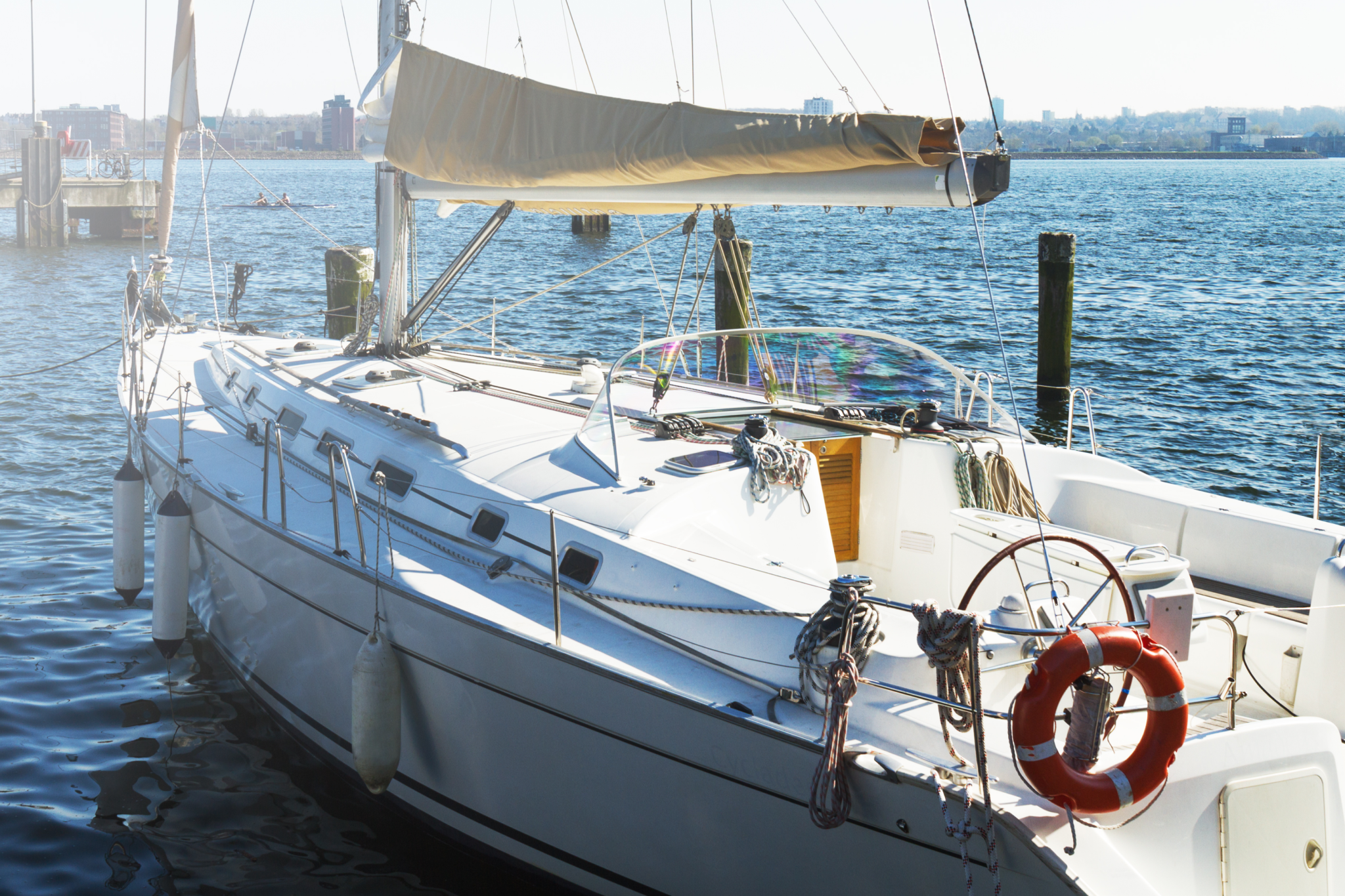 Sleek sailboat moored at a peaceful dock — ideal for showcasing classic and nautical-inspired best boat names.
