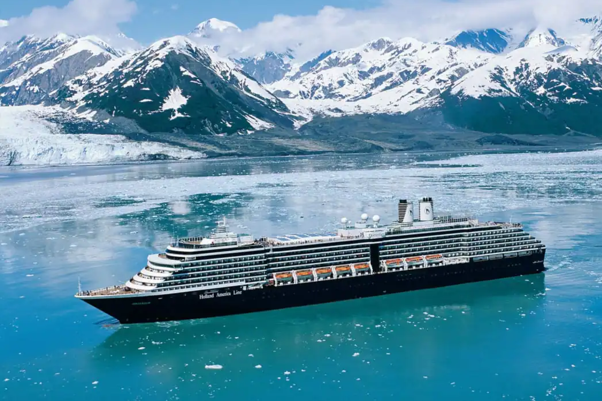 Holland America Line cruise ship in Alaska glacial waters, representing the best cruise lines for couples seeking cultural elegance