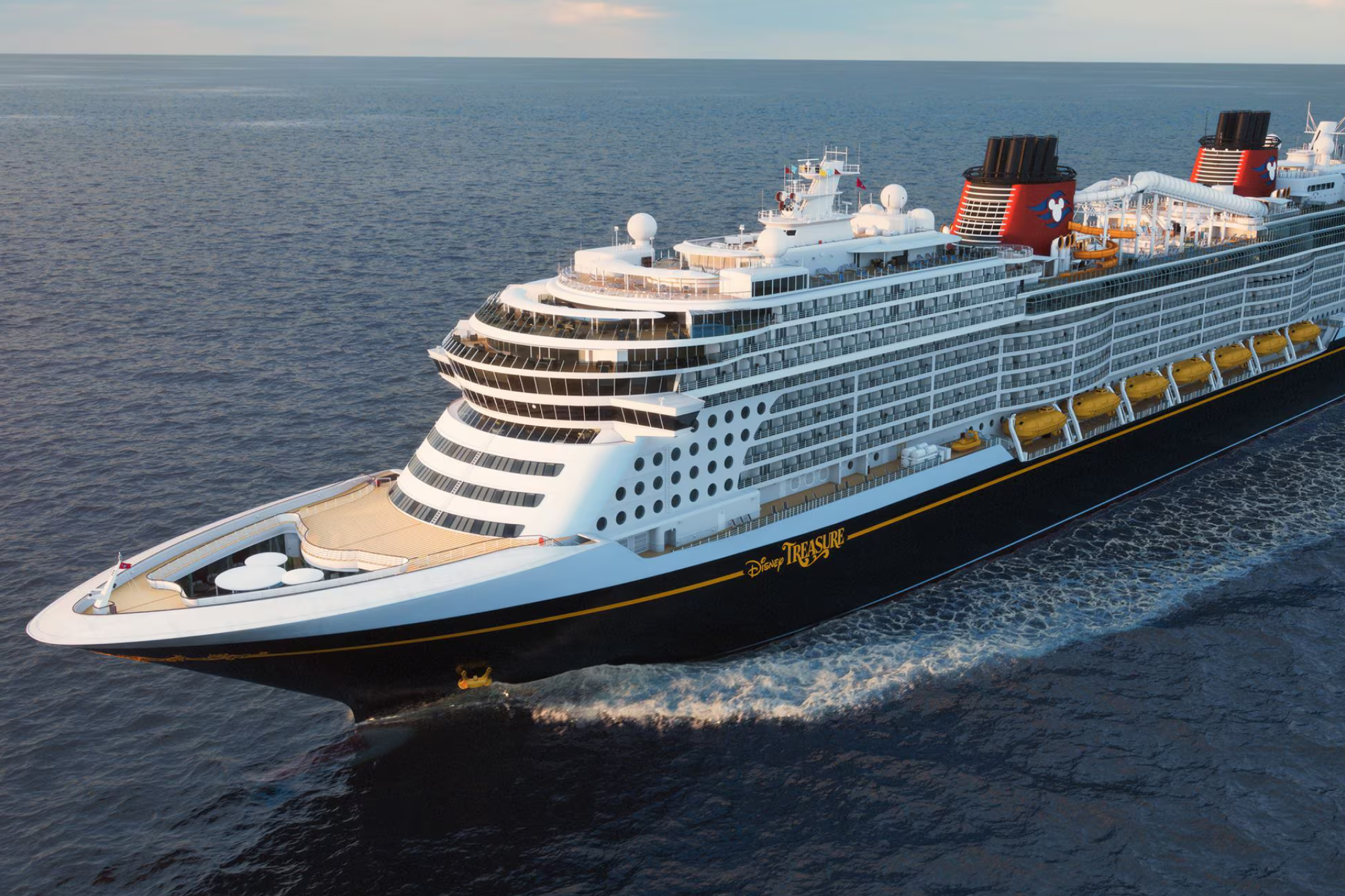 Disney Cruise Line ship sailing at sea with iconic design and family-focused amenities, representing the gold standard and top choice in the Best Cruises for Families.