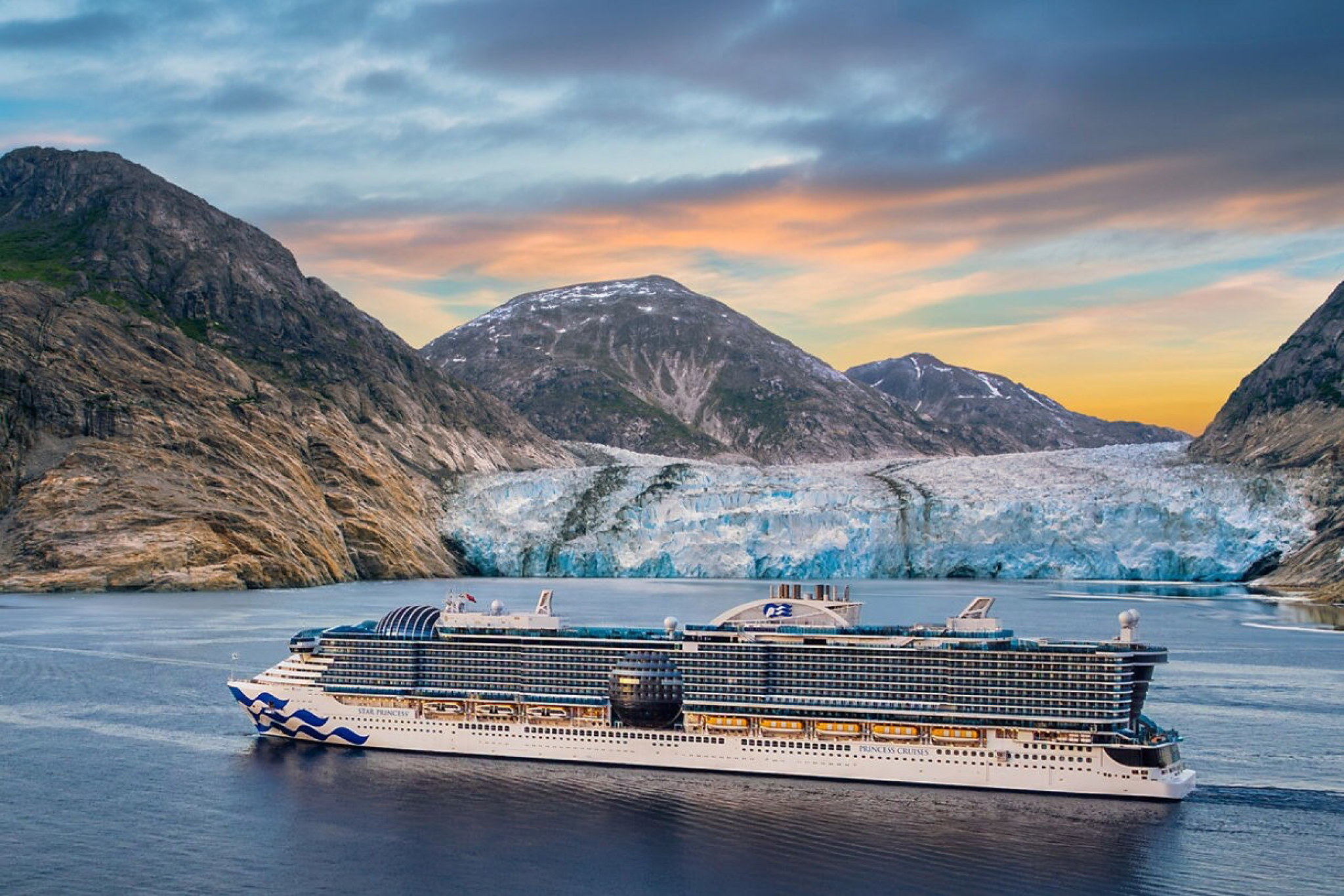 Princess Cruises ship navigating Alaska’s Glacier Bay surrounded by majestic mountains — one of the Best Cruises for Honeymoon couples seeking breathtaking scenery and timeless romance.