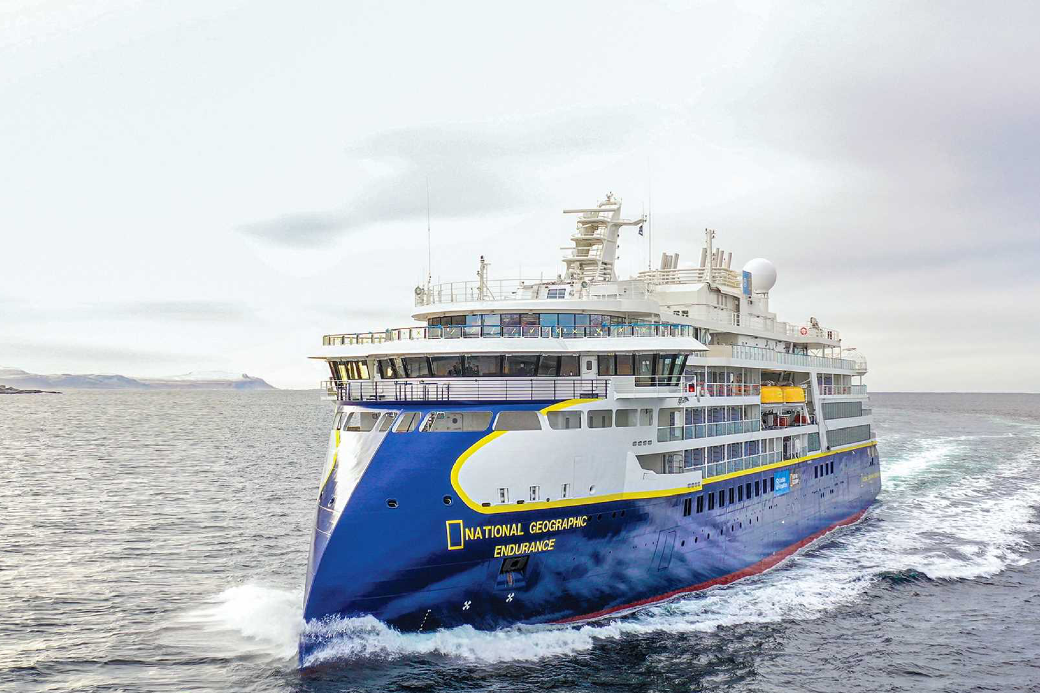 National Geographic Endurance ship cutting through open seas, highlighting the science-driven approach that places it among the best expedition cruise lines.