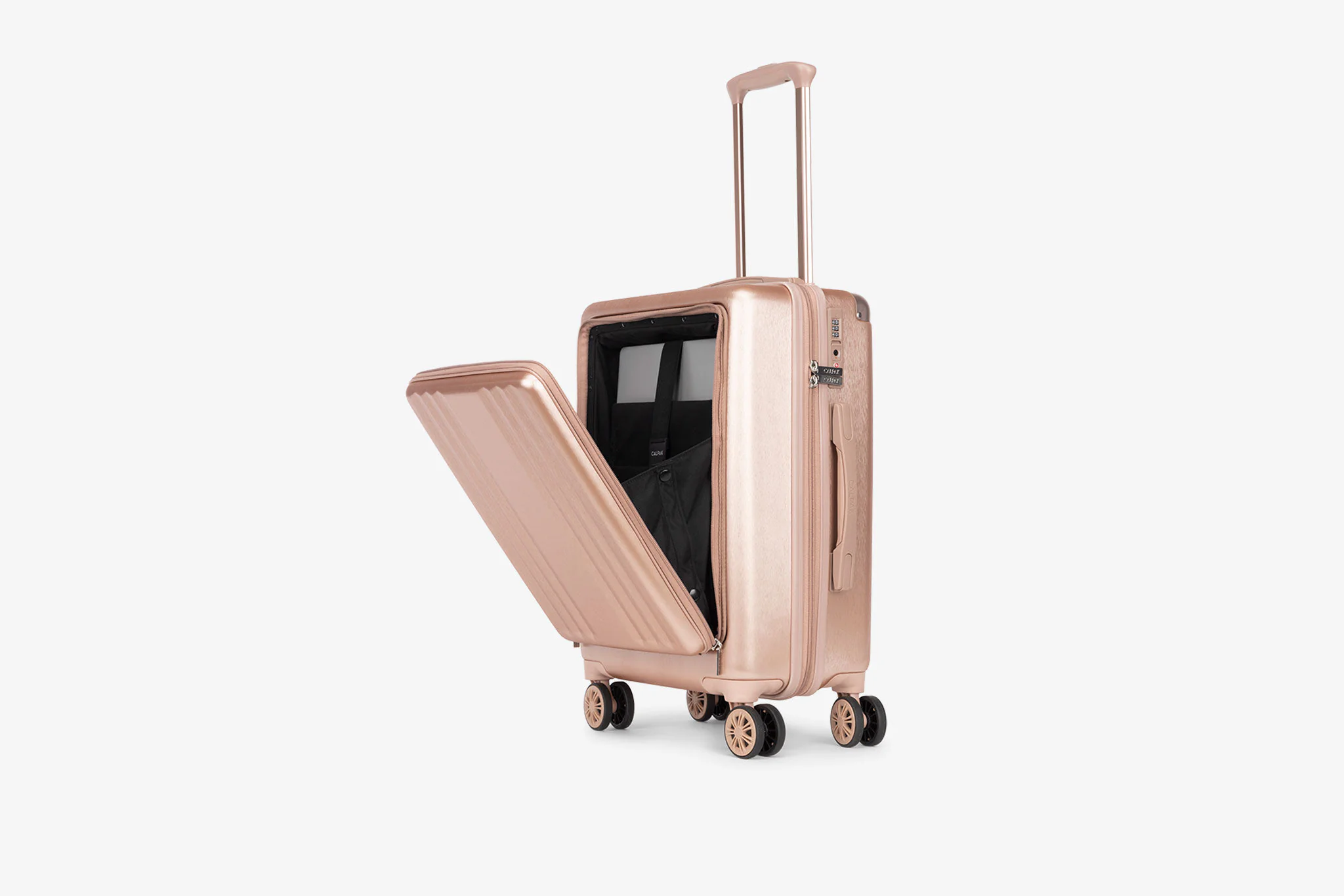 Calpak Ambeur Large Luggage in rose gold with metallic finish and zip expansion, among the best luggages for maximizing interior space with style.