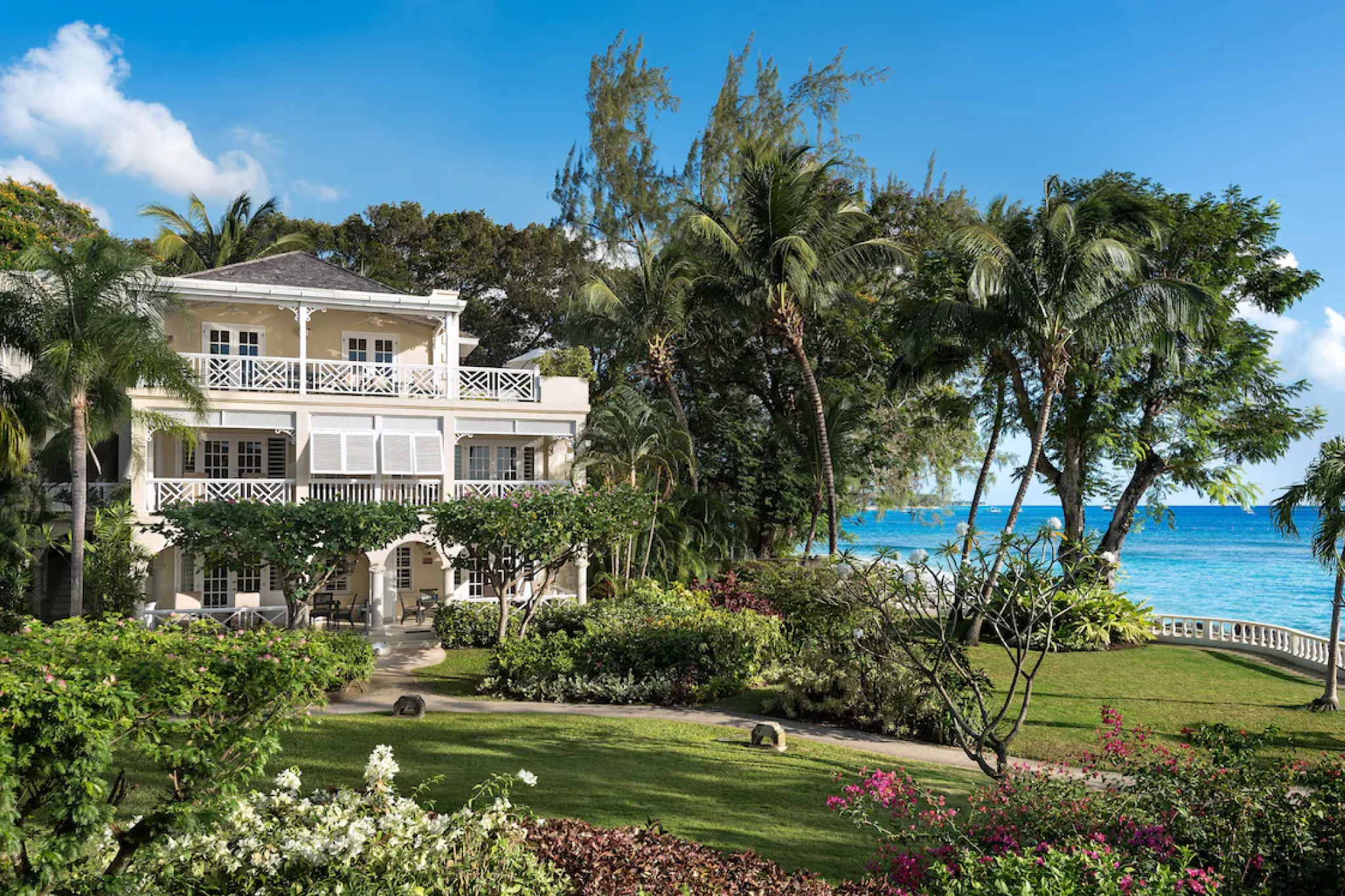 Garden and oceanfront suites at Coral Reef Club, a family-owned resort regarded as the crown jewel among the best luxury resorts in Barbados.