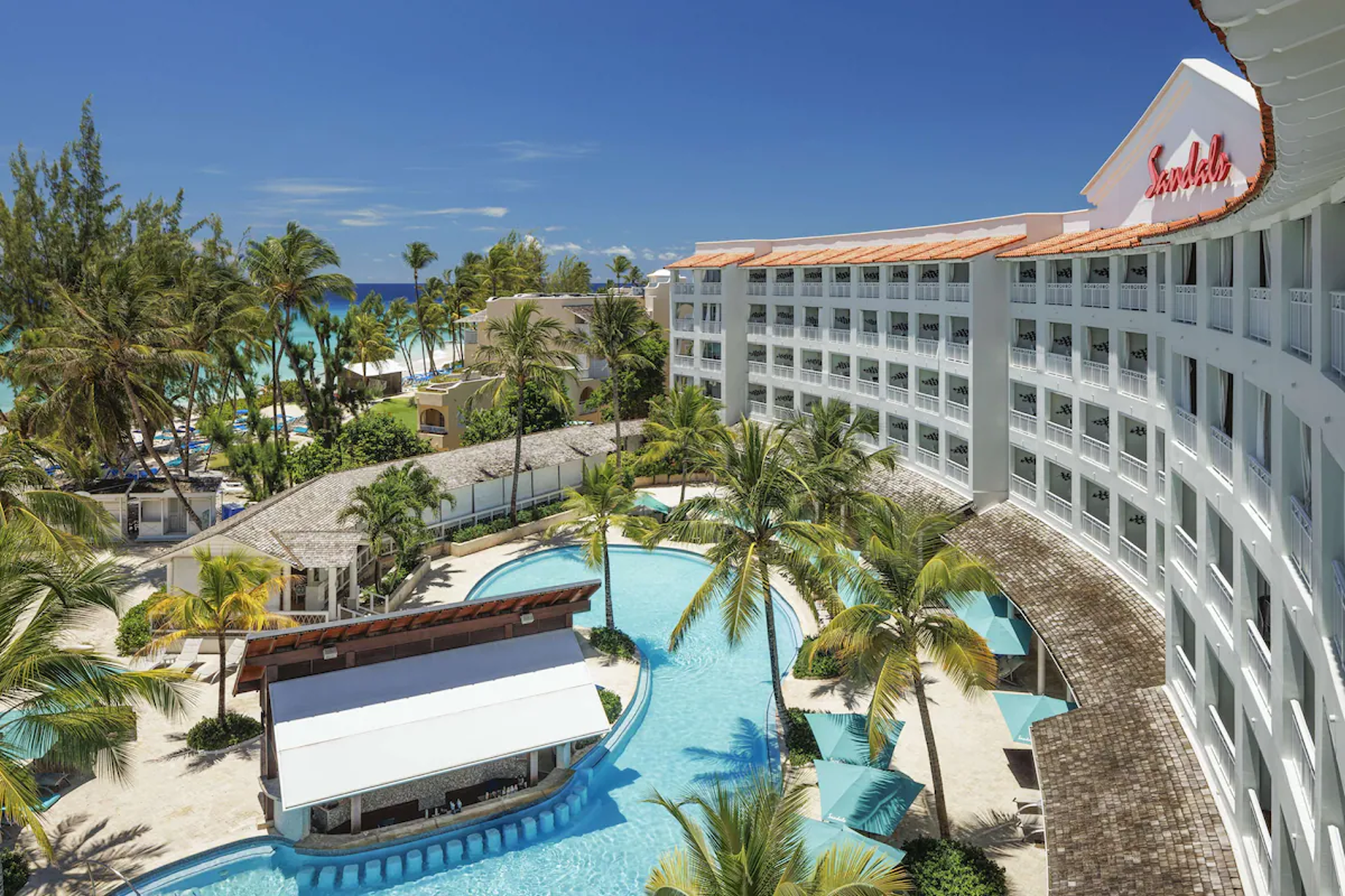 Aerial view of Sandals Barbados with lagoon-style pools and beachfront location, one of the best luxury resorts in Barbados.