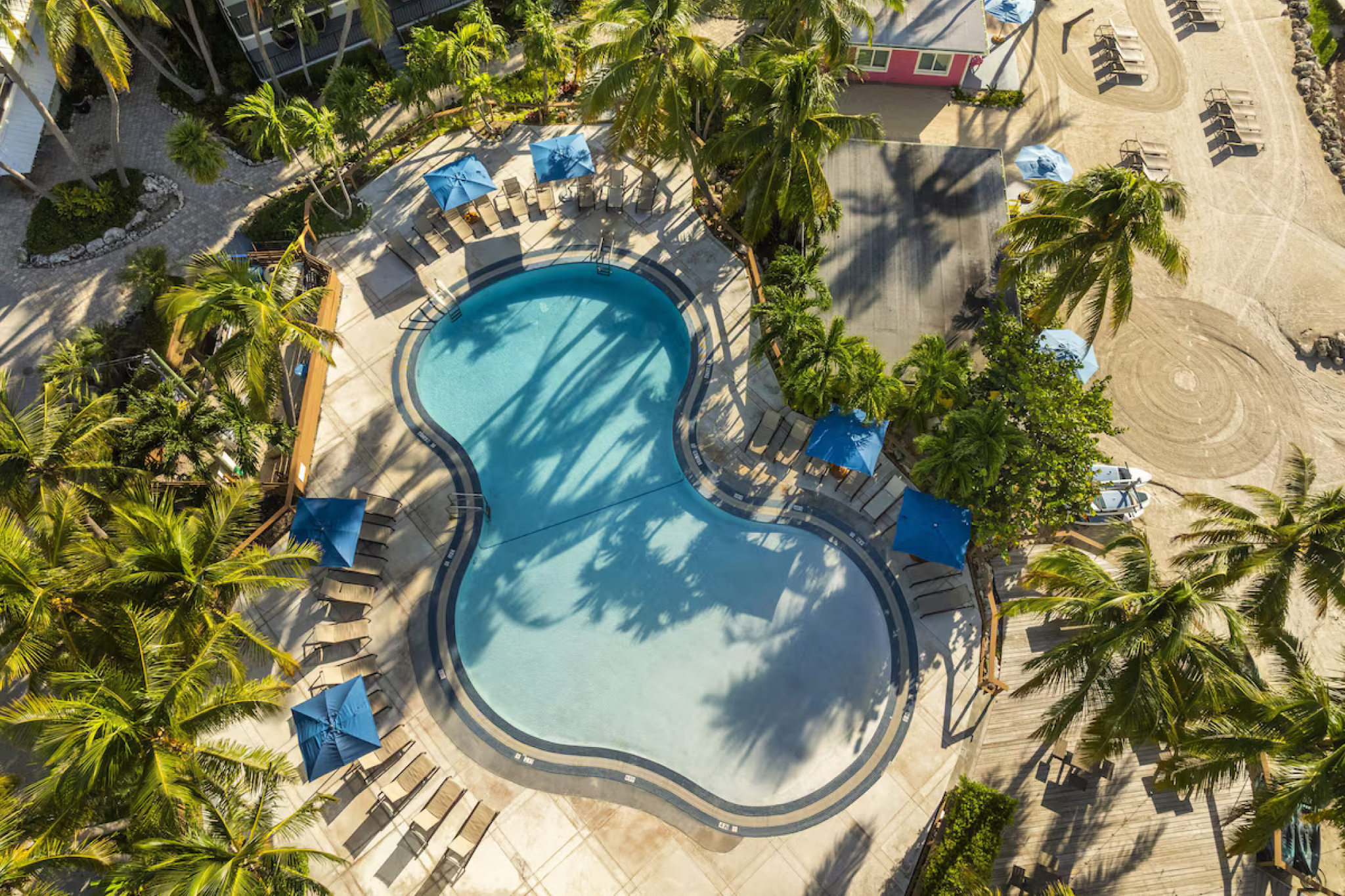 Aerial view of La Siesta Resort & Villas’ pool and beachfront setting, reinforcing its spot among the best resorts in Florida Keys for families.