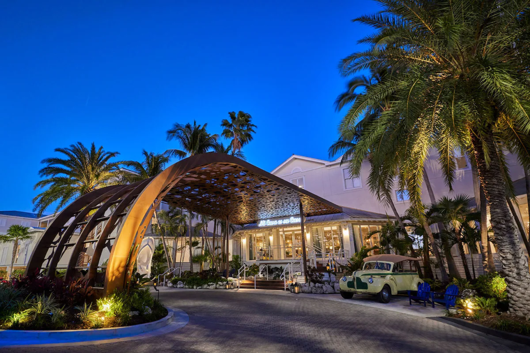 Night view of Margaritaville Beach House Key West entrance with tropical charm, placing it high on the list of best resorts in Florida Keys.