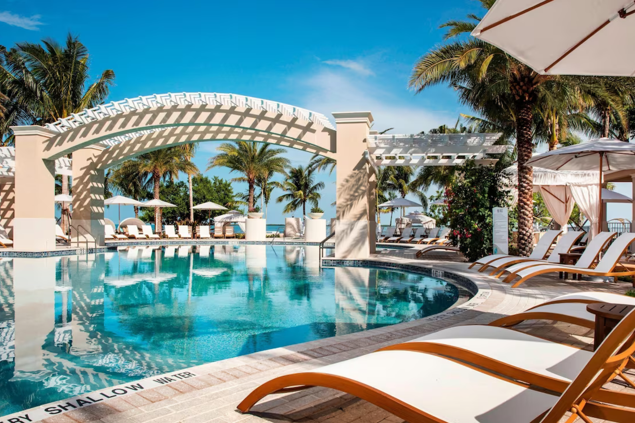 Luxury poolside cabanas and ocean views at Playa Largo Resort & Spa, highlighting its place among the best resorts in Florida Keys.