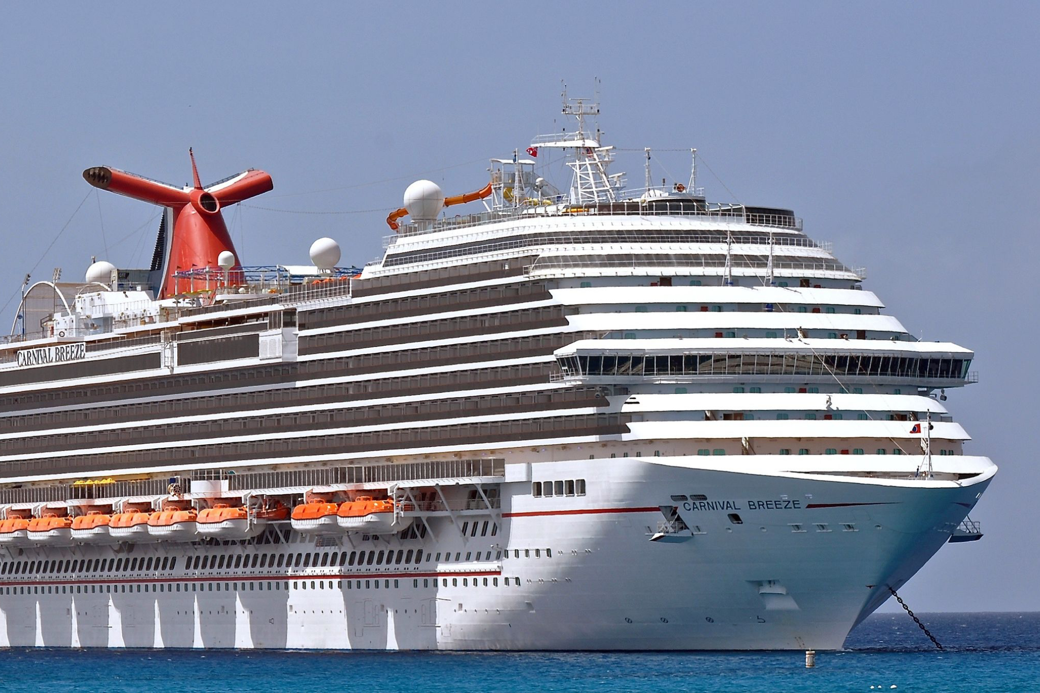 Carnival Cruise Lines Ships by Size image featuring Carnival Breeze with a balanced Dream Class layout, visible pool deck, and stacked stateroom balconies