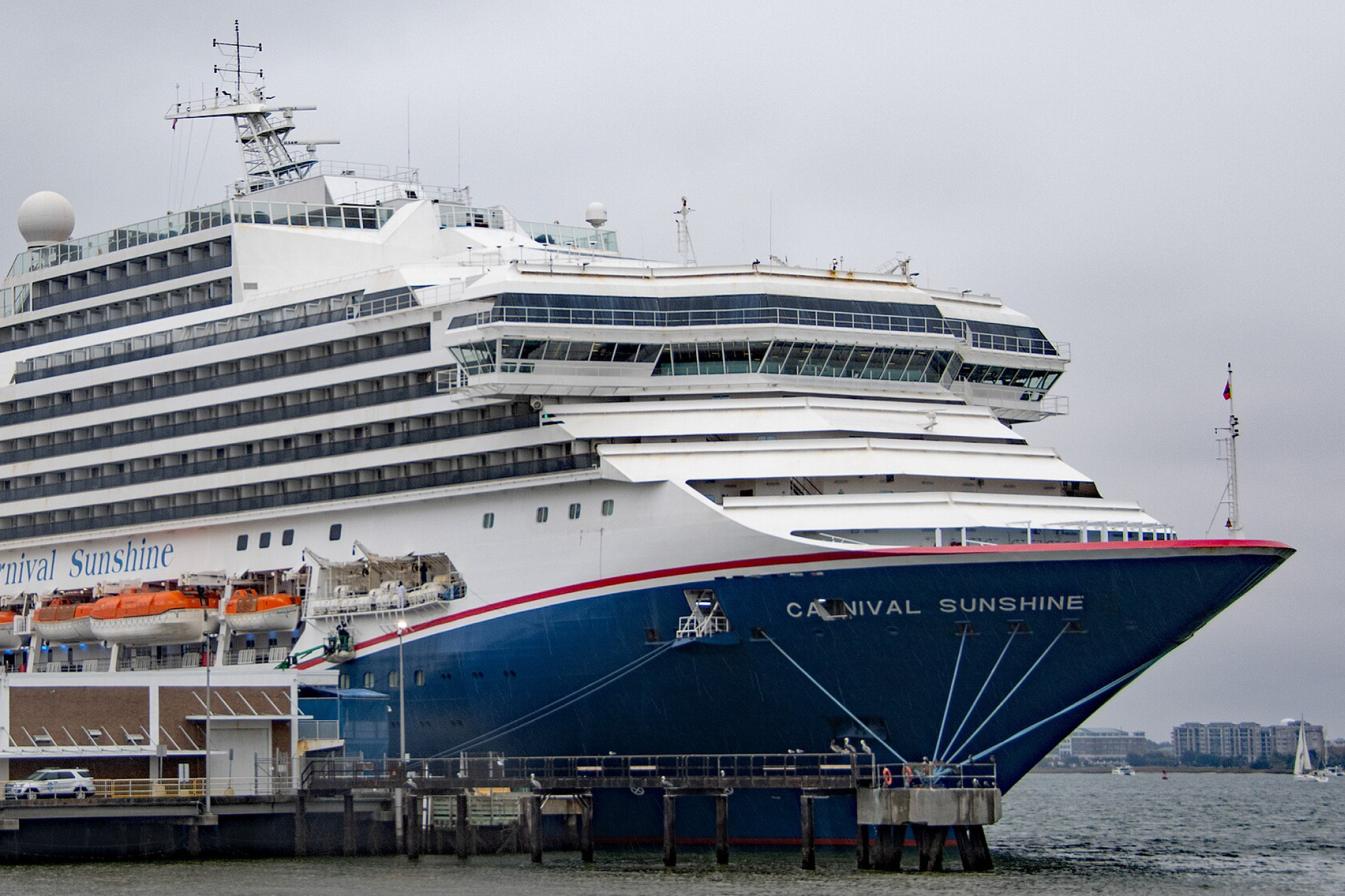 Carnival Cruise Lines Ships by Size photo of Carnival Sunshine at sea, highlighting its compact Sunshine Class footprint, redesigned decks, and open-air pool areas