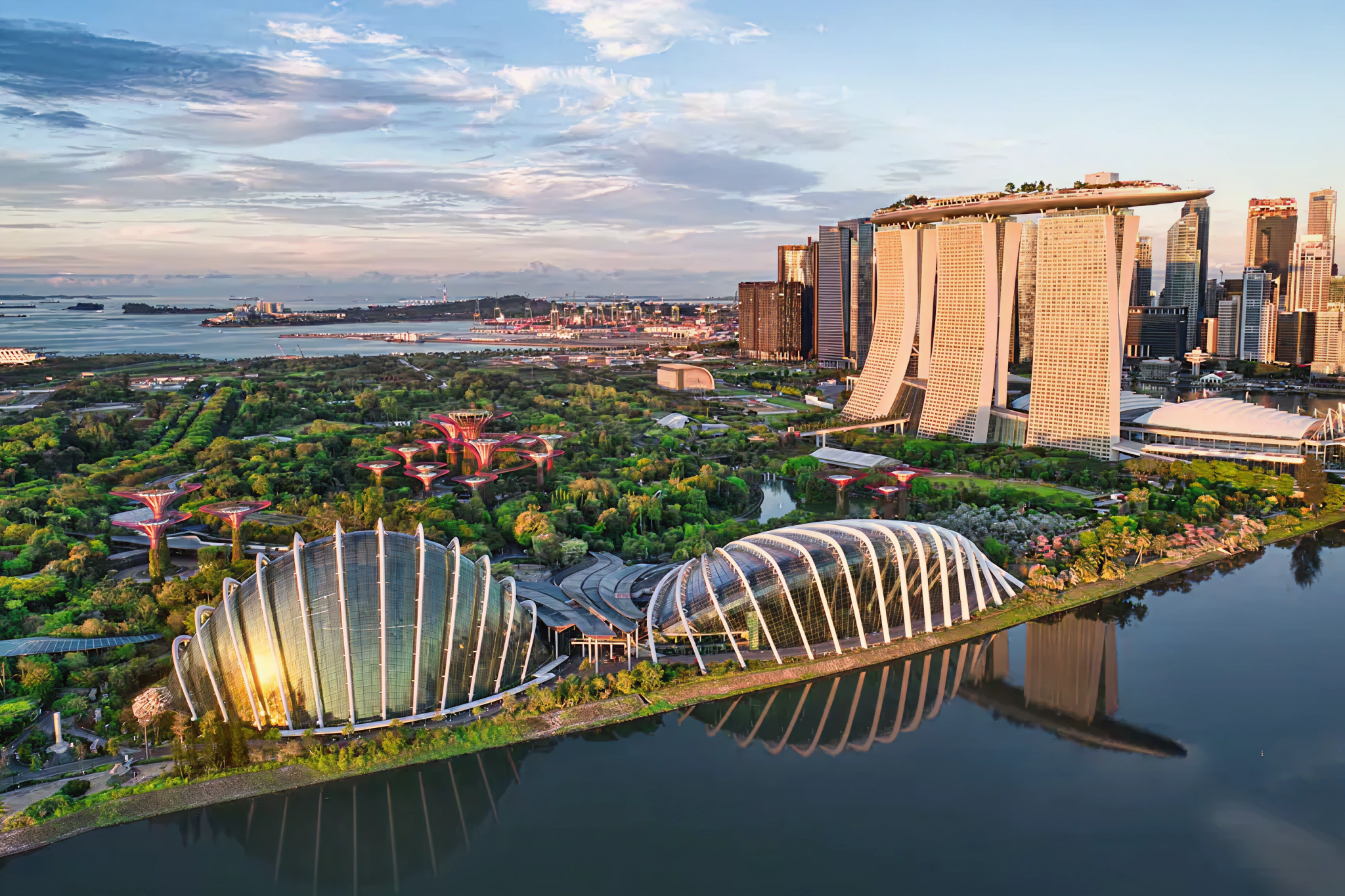 Aerial view of Singapore’s Marina Bay skyline, homeport for Disney Adventure’s year-round cruises beginning in 2026