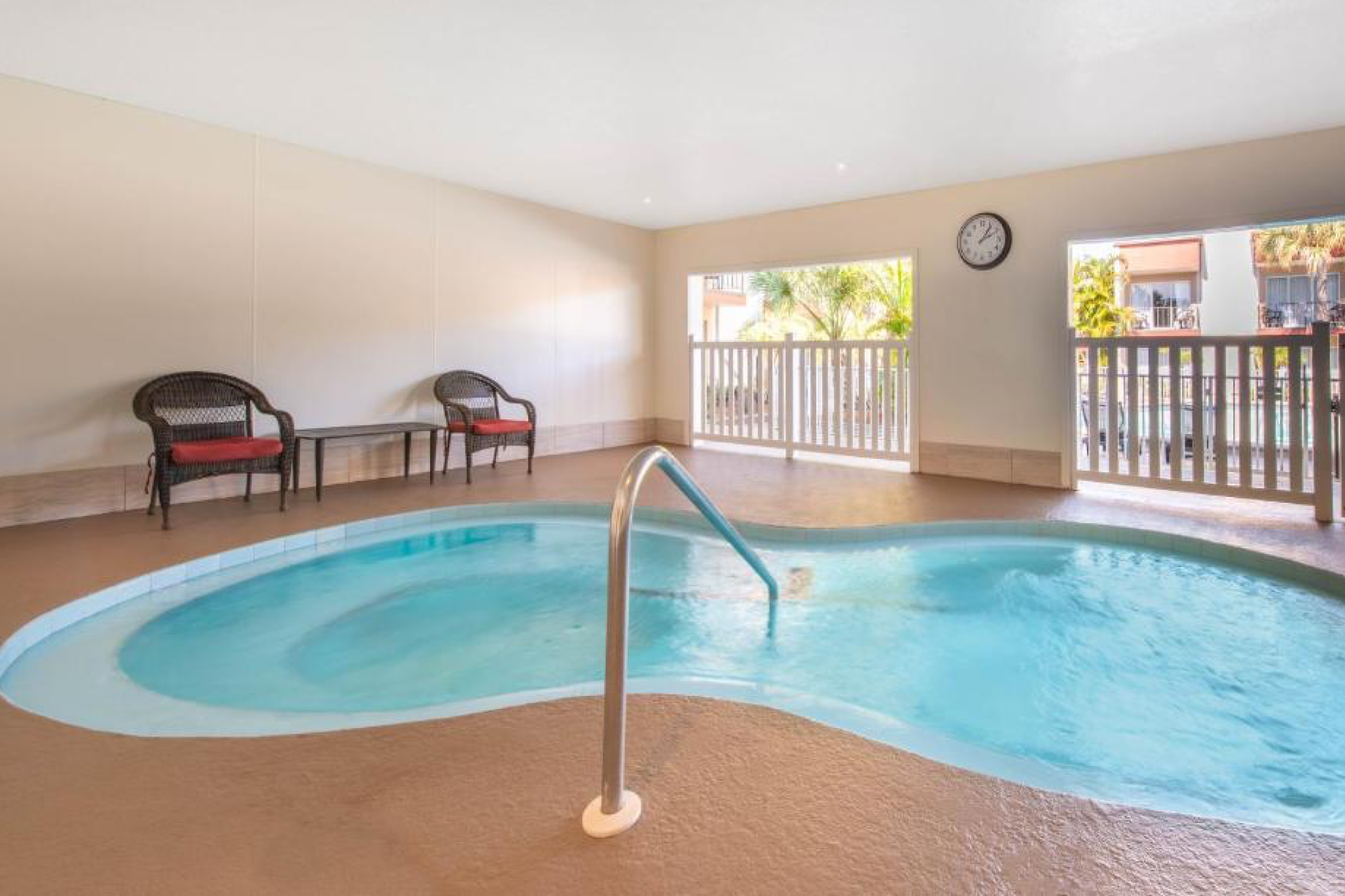 Indoor hot tub area at la quinta inn by wyndham clearwater central, offering a quiet, semi-enclosed space for relaxation.