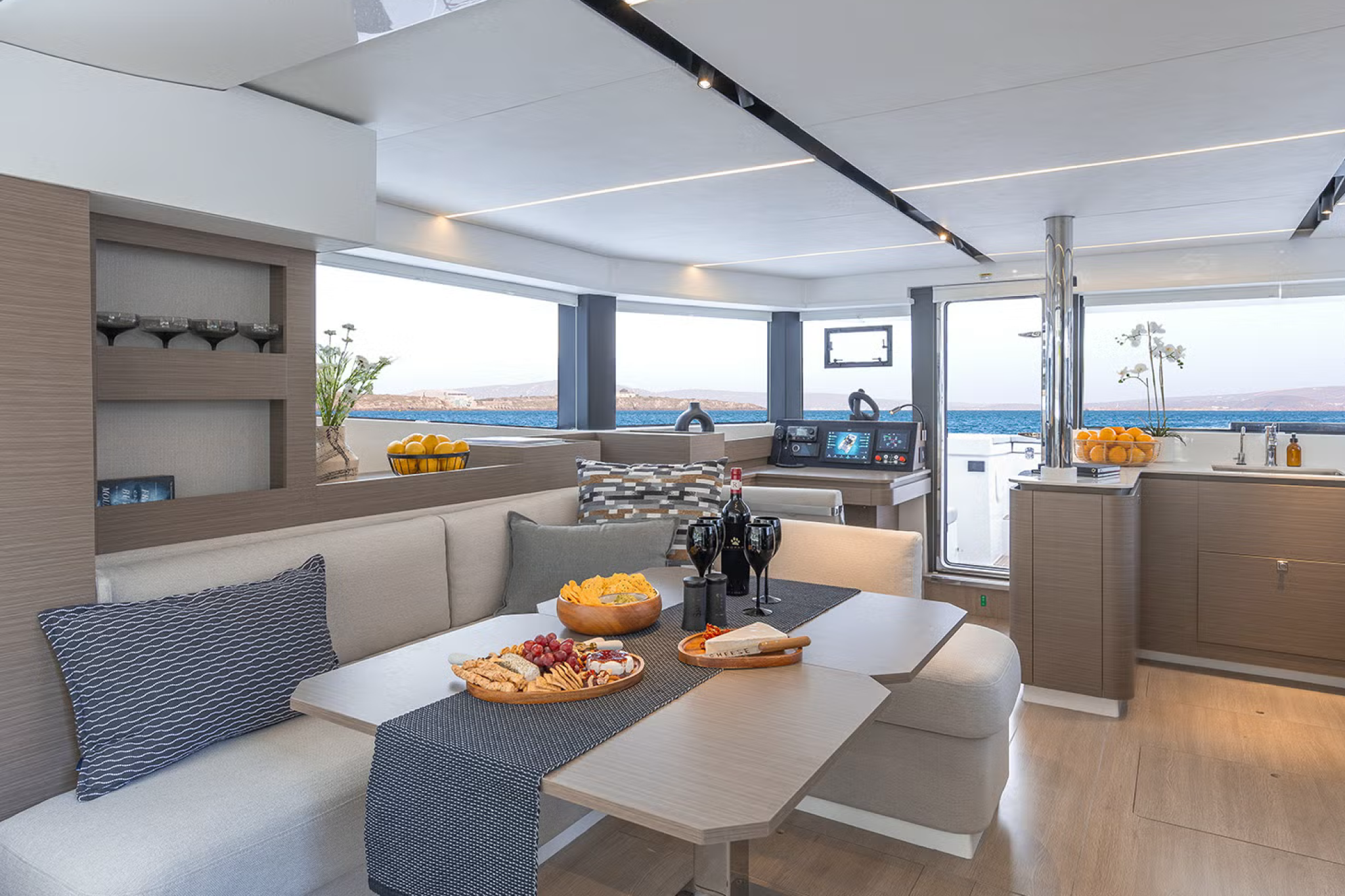 Leopard 46 sailing at sunset with passengers on deck, highlighting the catamaran’s suitability for cruising and liveaboard lifestyles