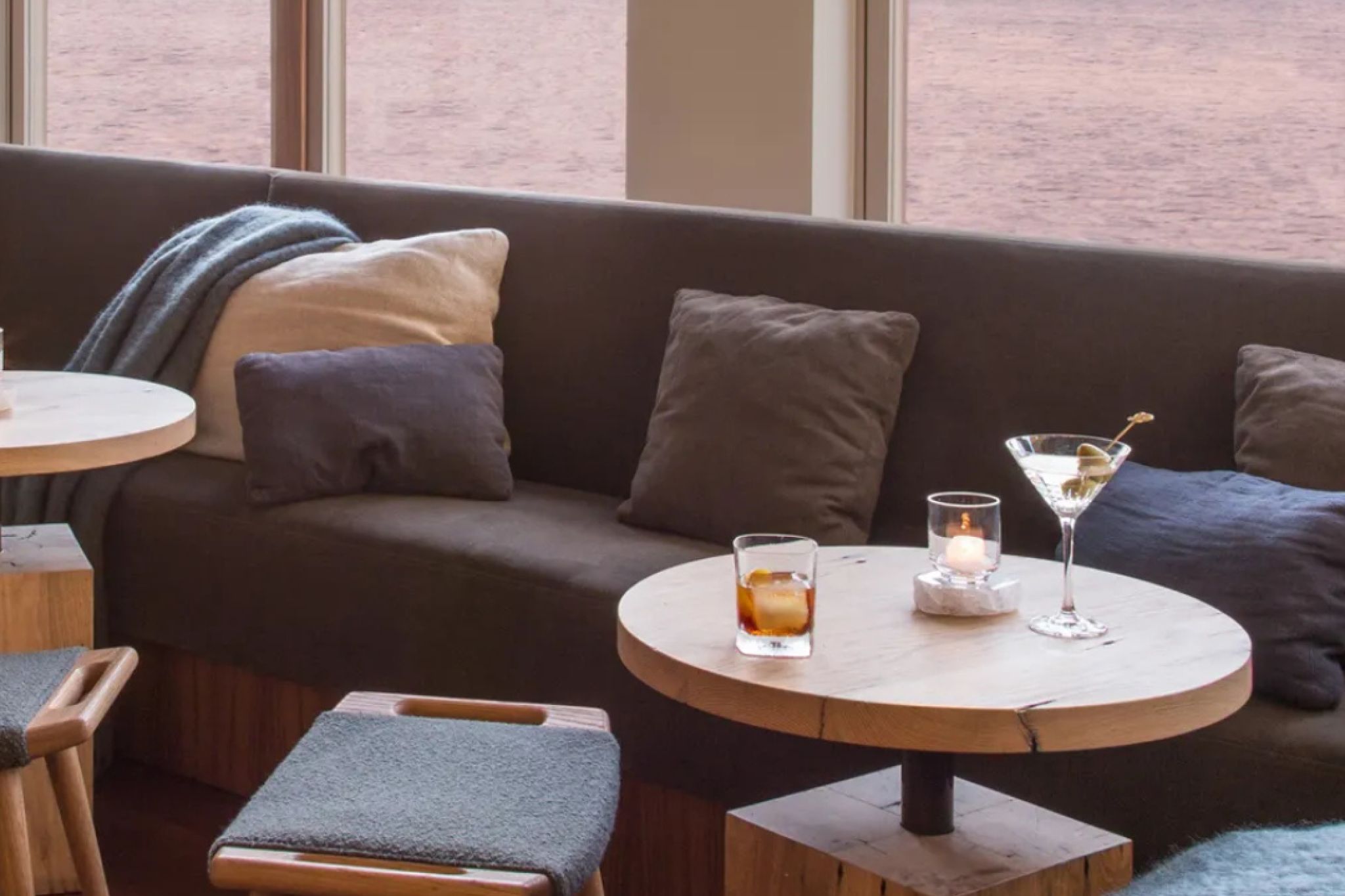 Cozy lounge area at Malibu Beach Inn with cocktails and ocean backdrop