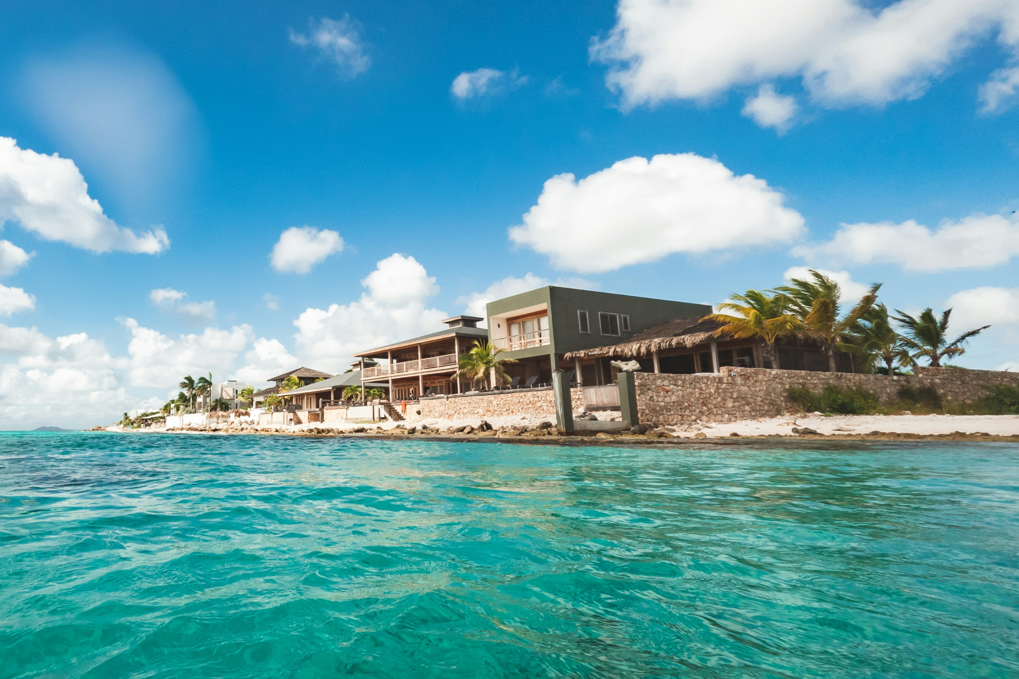 Waterfront villas along Bonaire's crystal-clear coastline, representing the most scenic islands in the Caribbean