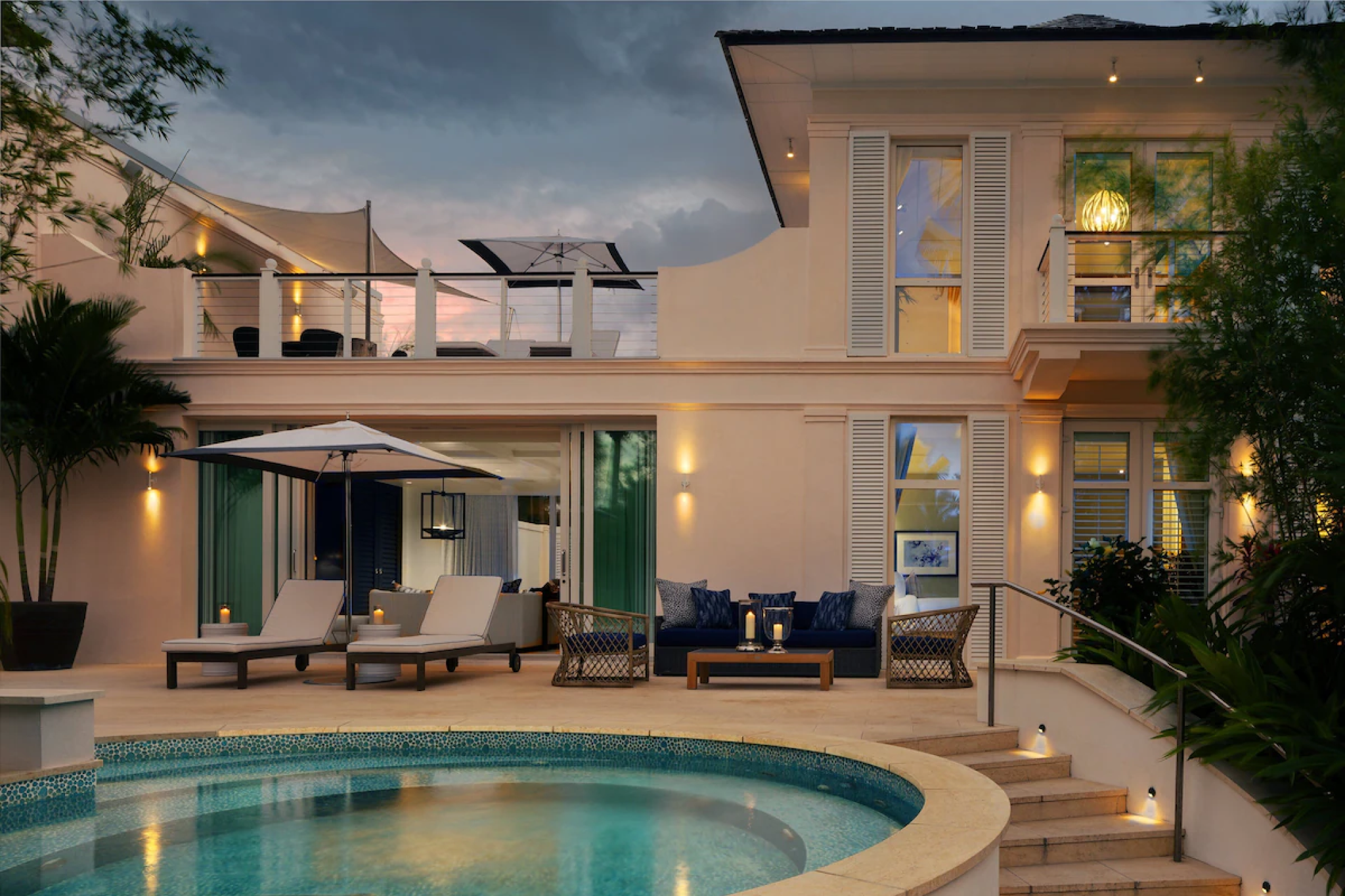 Evening view of a private villa and plunge pool at Rosewood Baha Mar.