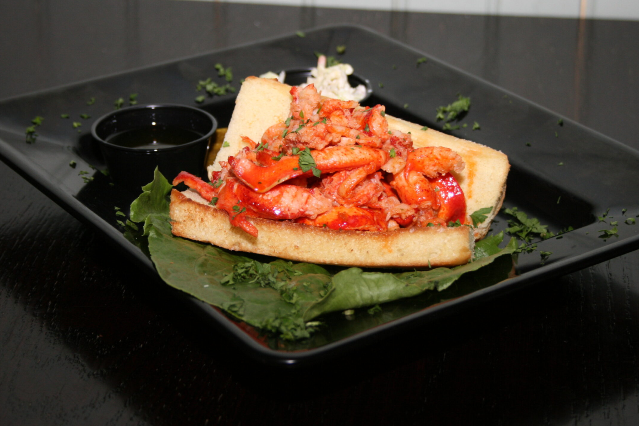 Lobster-roll plate served at Cape May Fish Market, capturing the simple, fresh flavors that make it one of the Best Seafood Restaurants in Cape May for casual diners.
