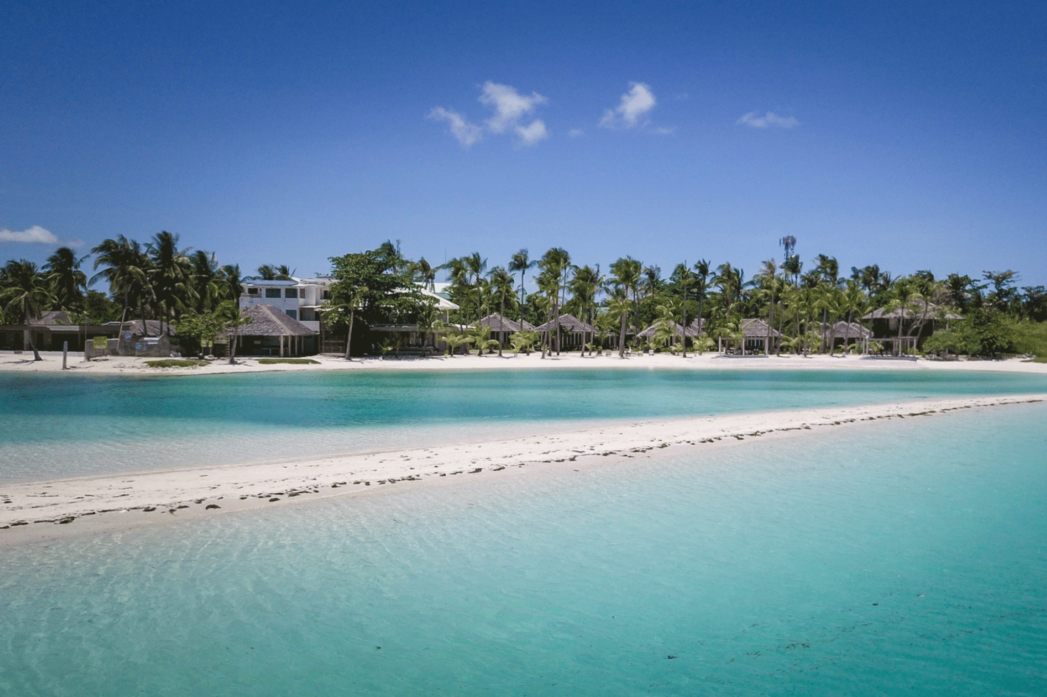 Wide sandbar and turquoise shallows in front of Kota Beach Resort, a classic beachfront spot for swimming and sunsets — Where to Stay in Bantayan Island.