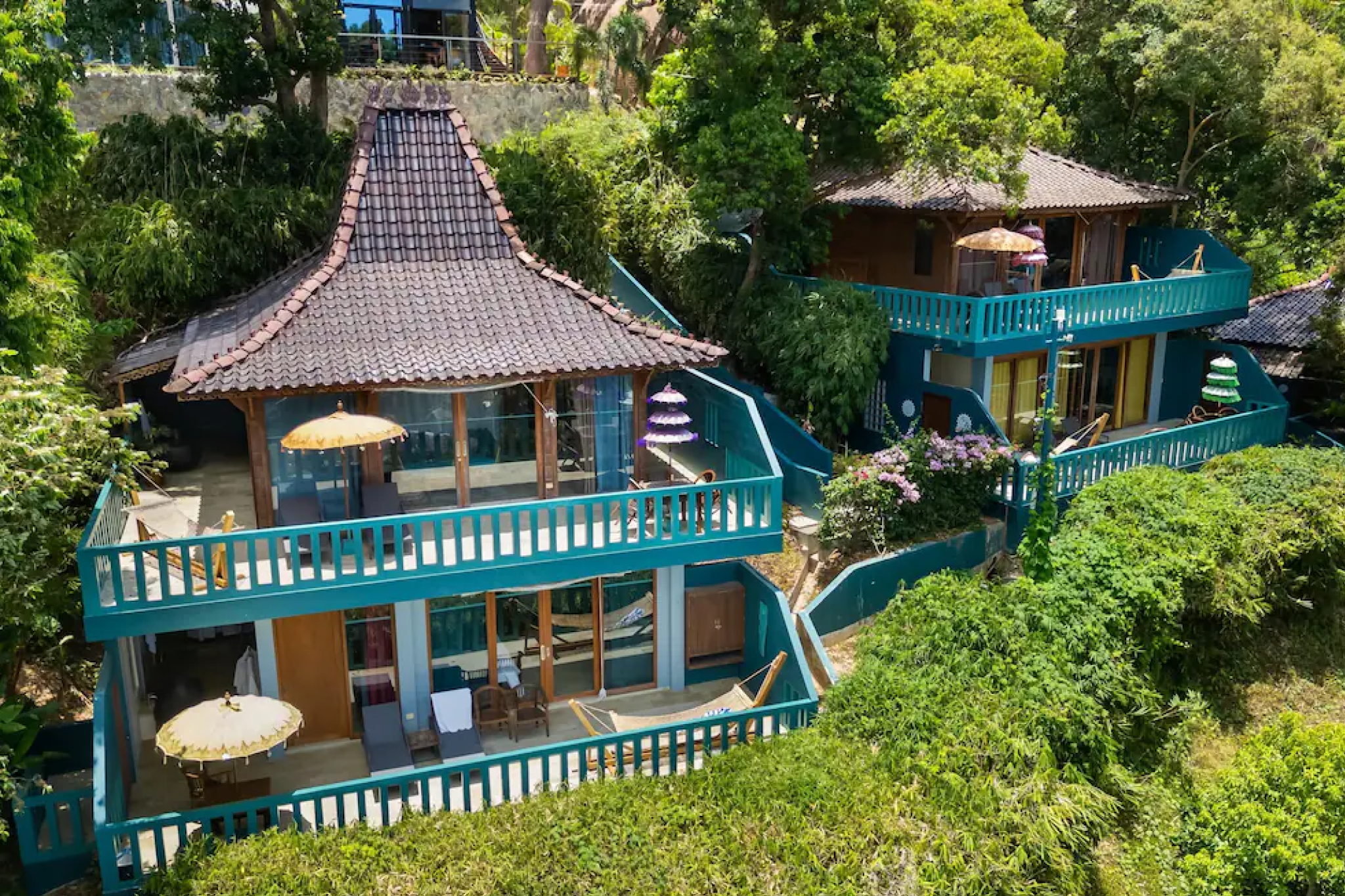 Traditional-inspired hillside villas surrounded by greenery — where to stay in El Nido, Palawan.