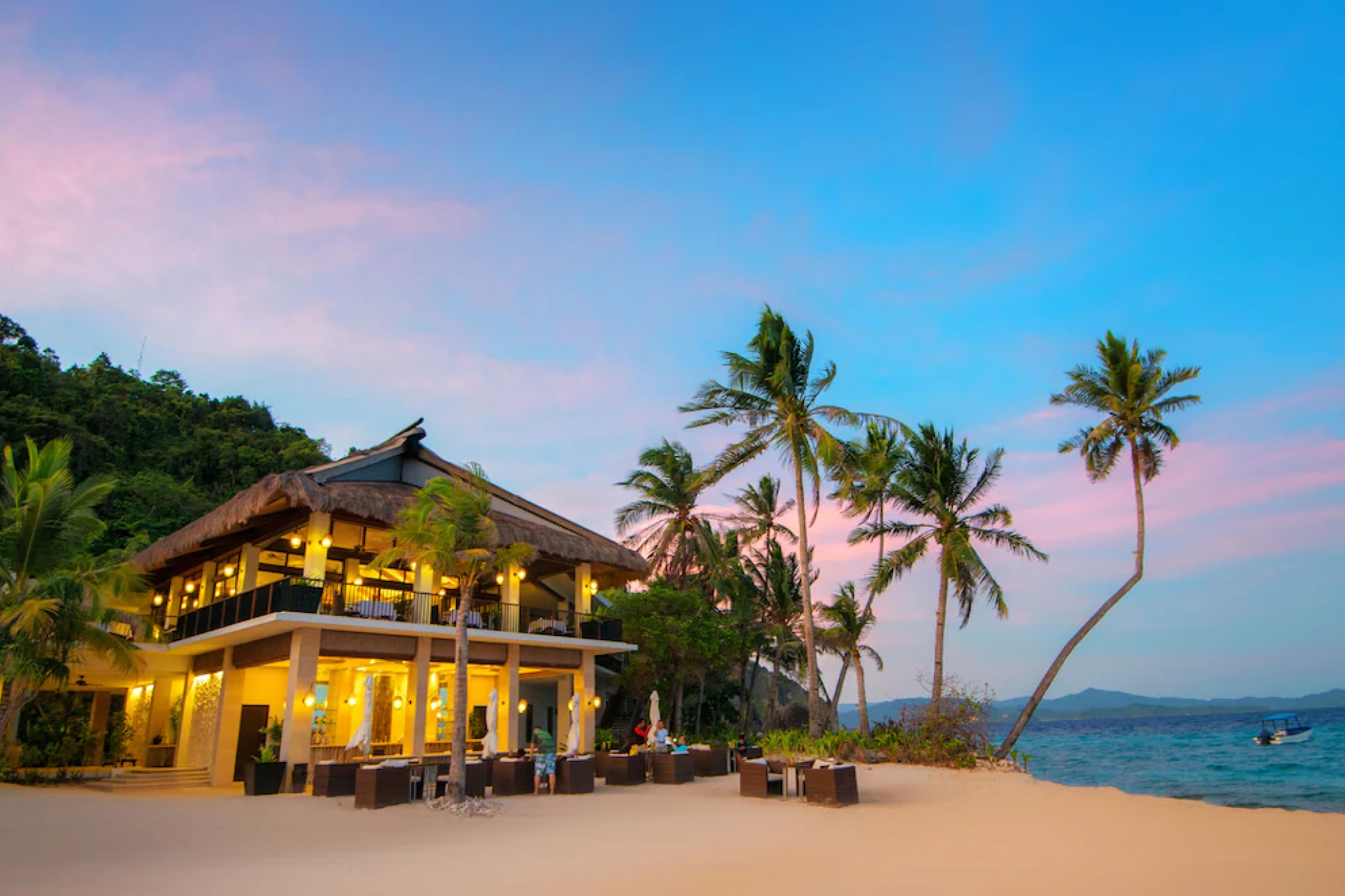 Luxury eco-resort with beachfront villas surrounded by limestone cliffs — where to stay in El Nido, Palawan.