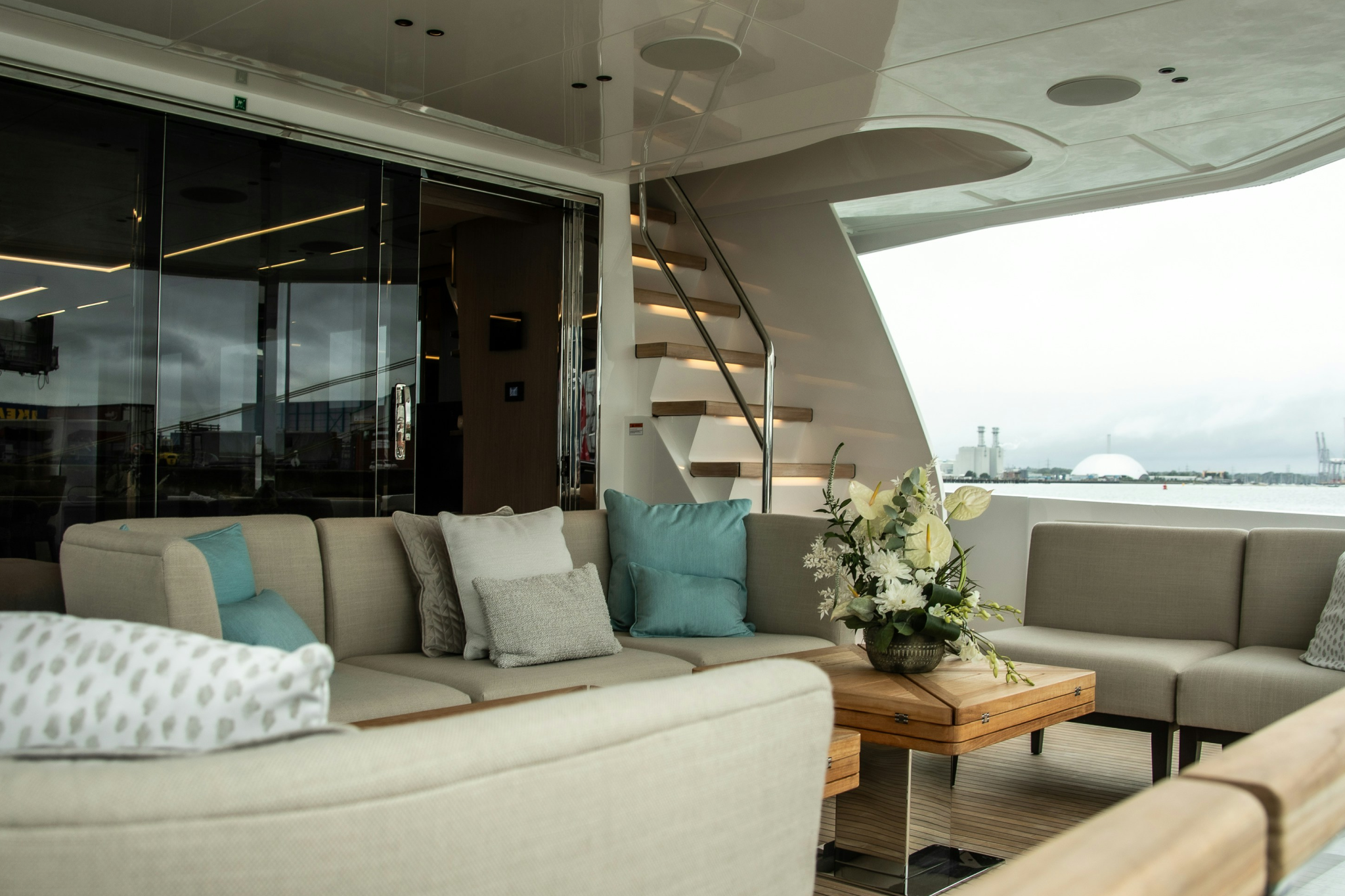 Interior of a luxury yacht featuring premium seating, used to show comfort differences in the yacht vs boat comparison.
